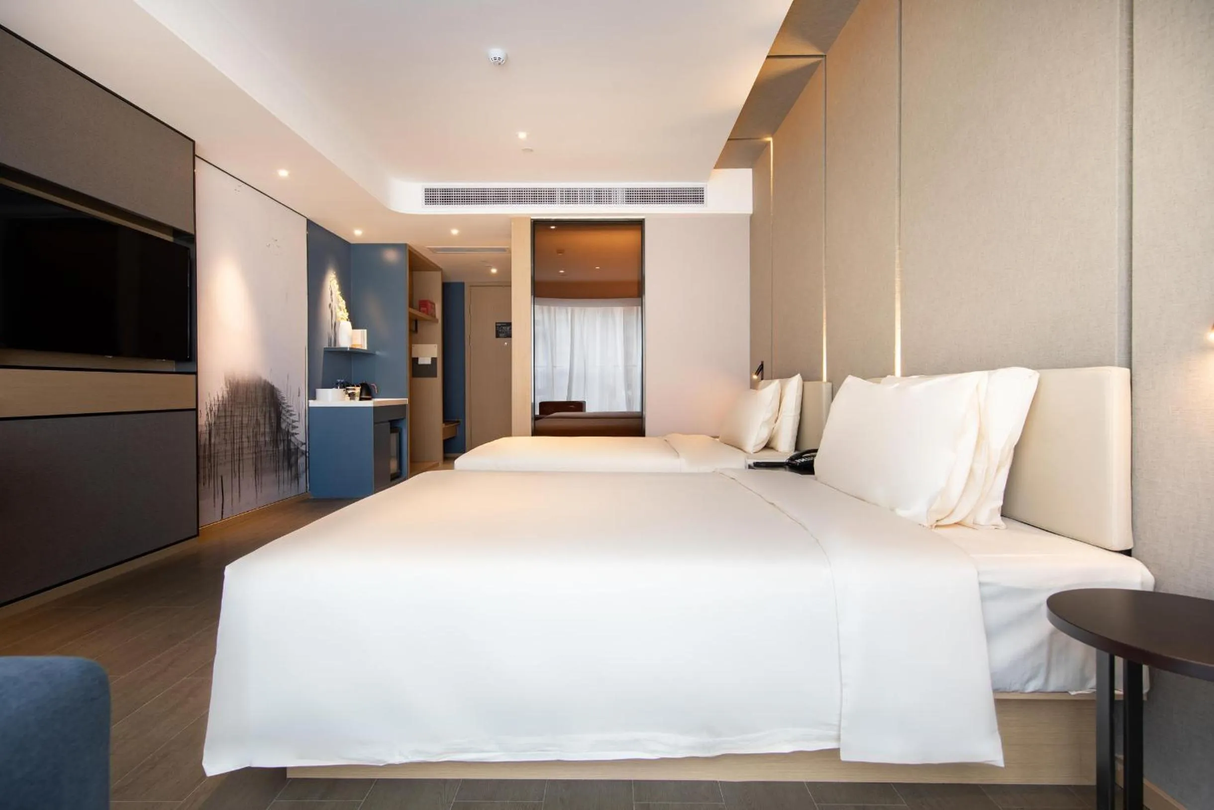 Bed in Atour Hotel Zhongshan North Station V-PARK Plaza