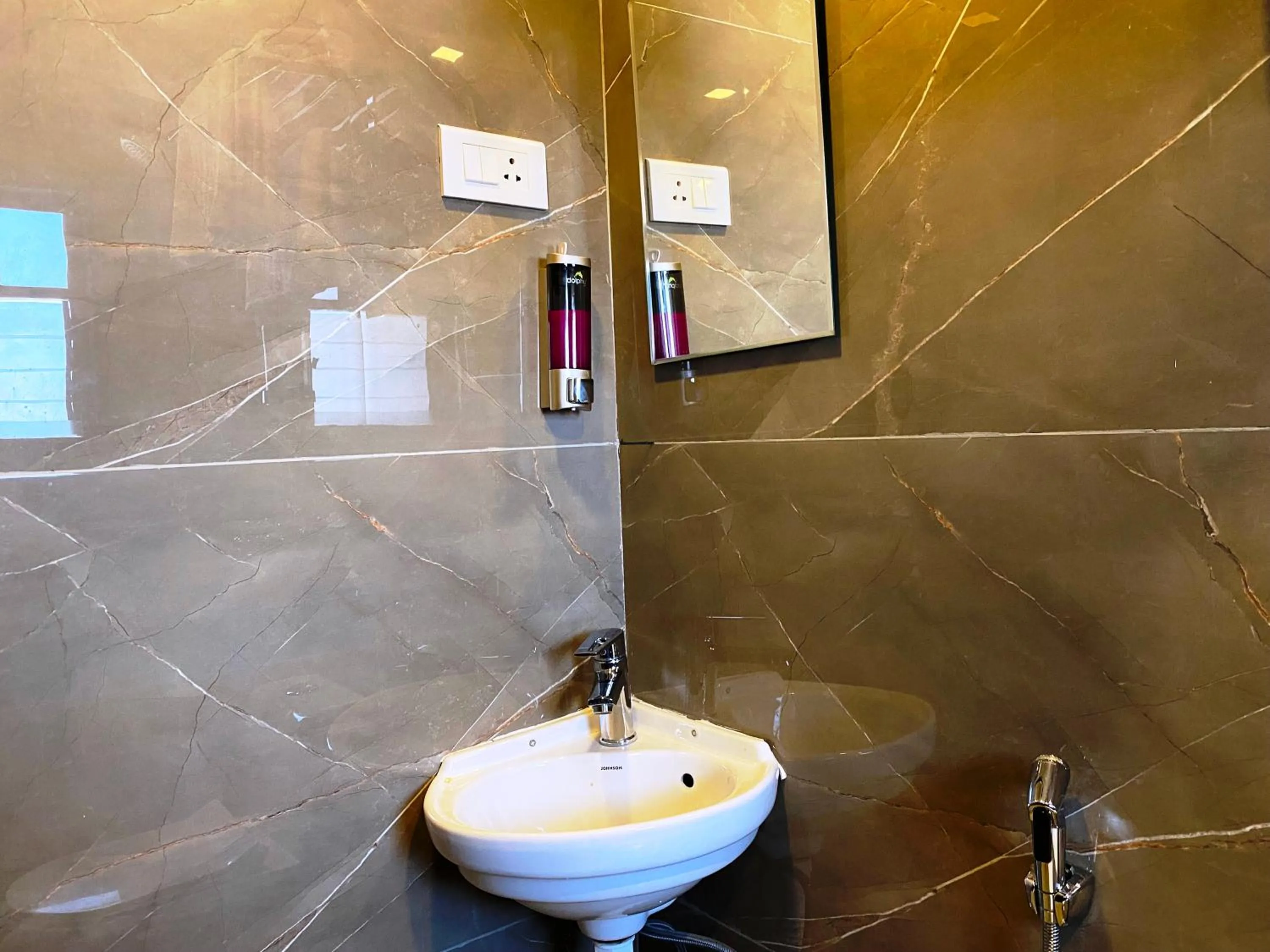 Bathroom in The Grand Sarovar Inn And Suites