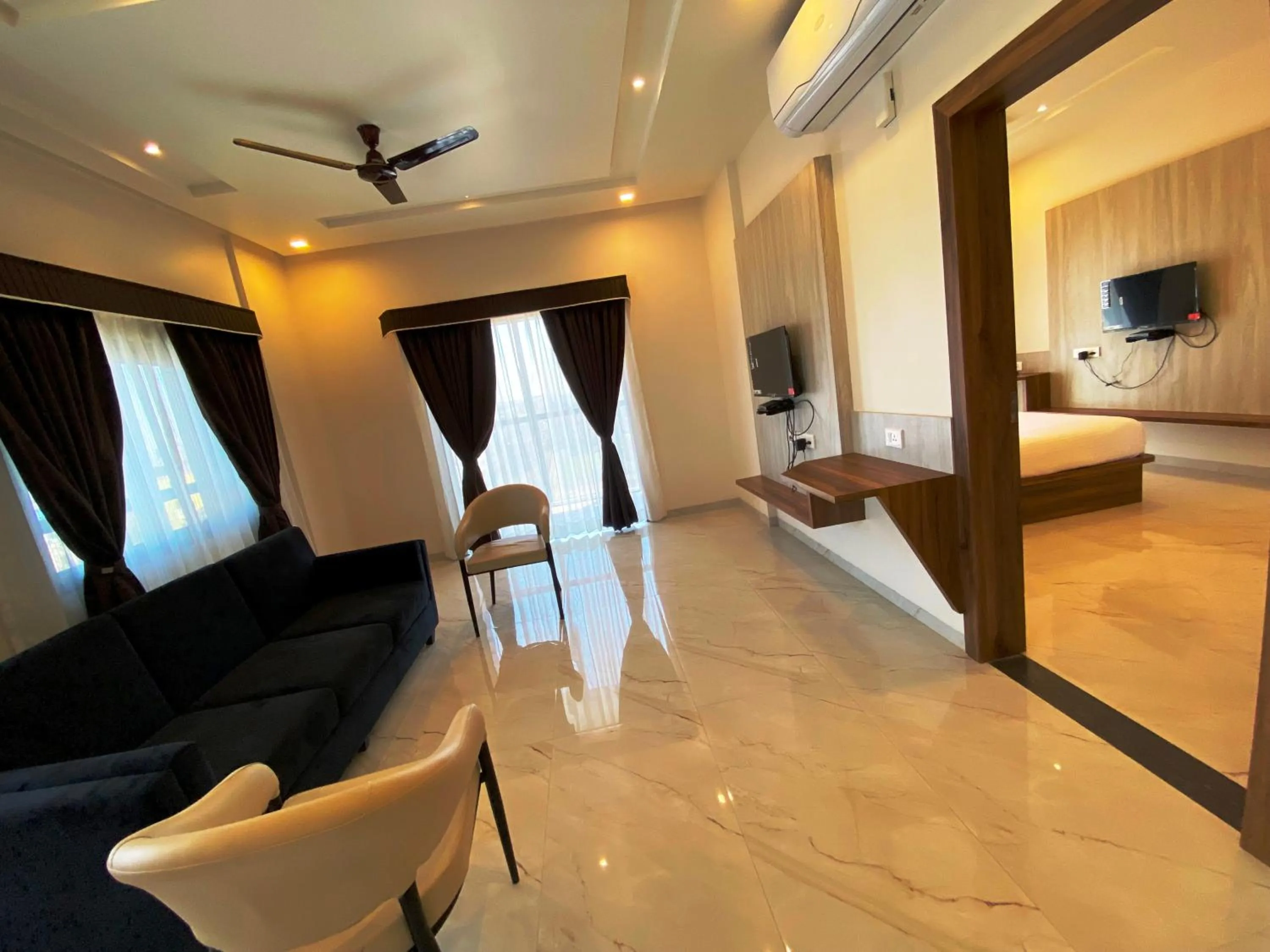 Living room in The Grand Sarovar Inn And Suites