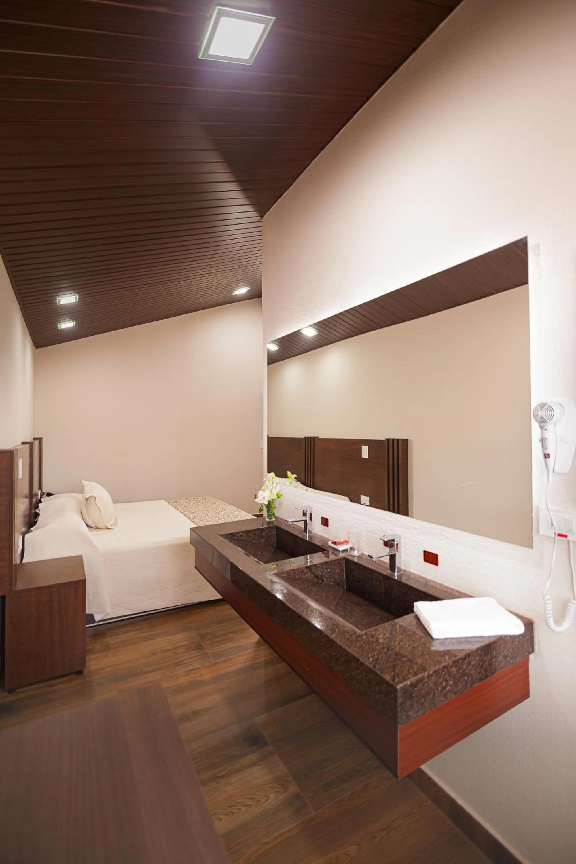 Photo of the whole room, Bed in Hotel Sirari By Regina