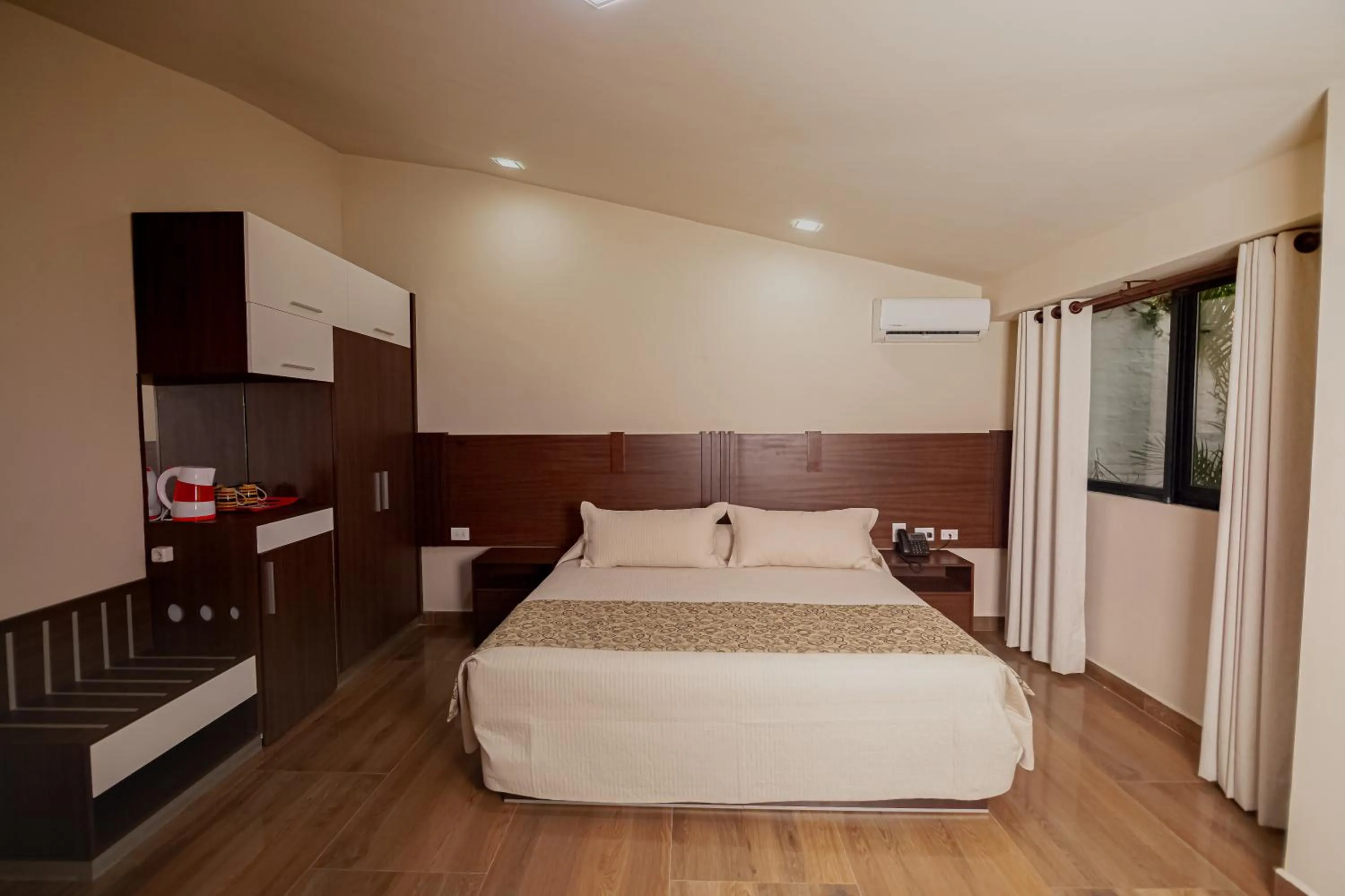 Bed in Hotel Sirari By Regina