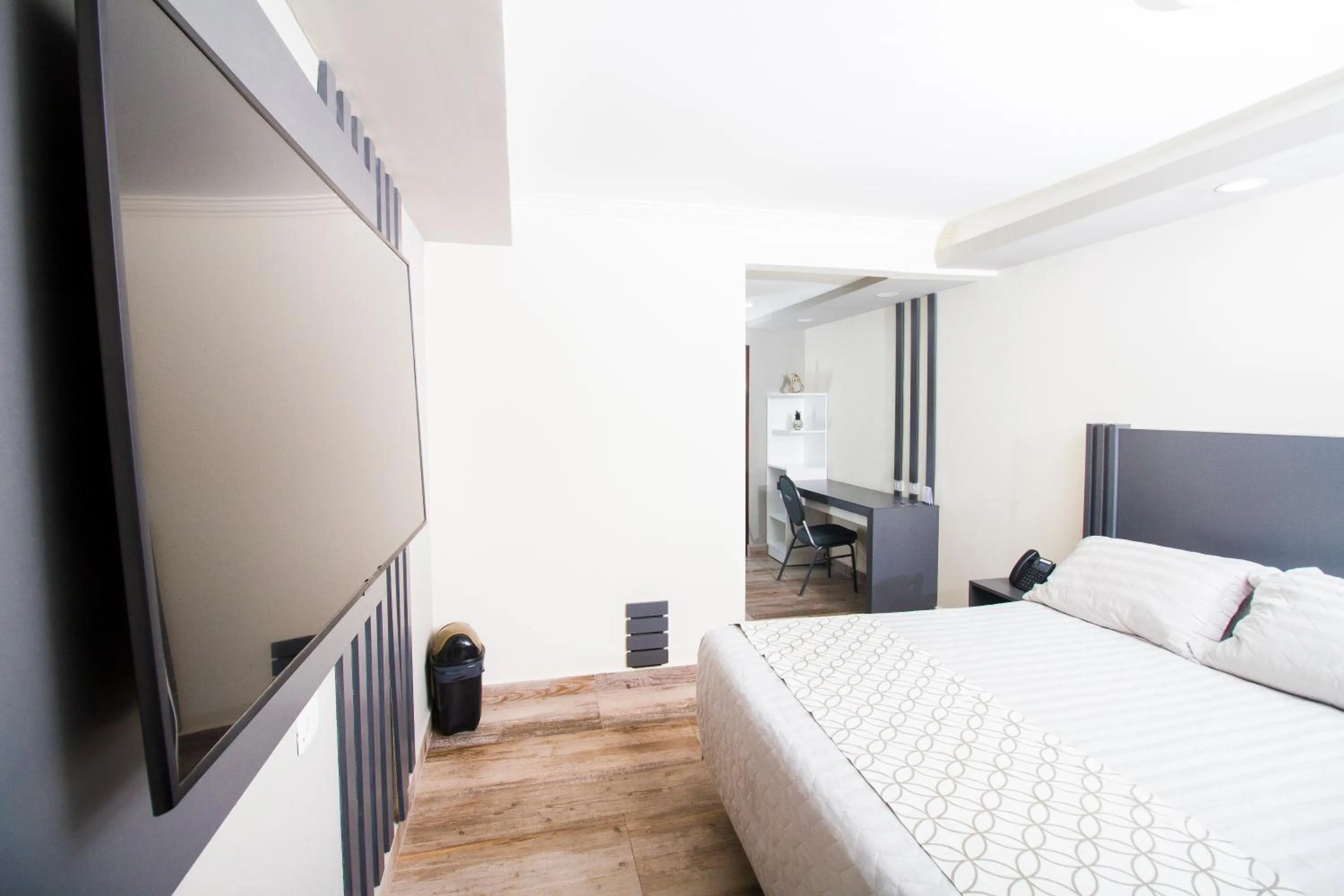 Photo of the whole room, Bed in Hotel Sirari By Regina