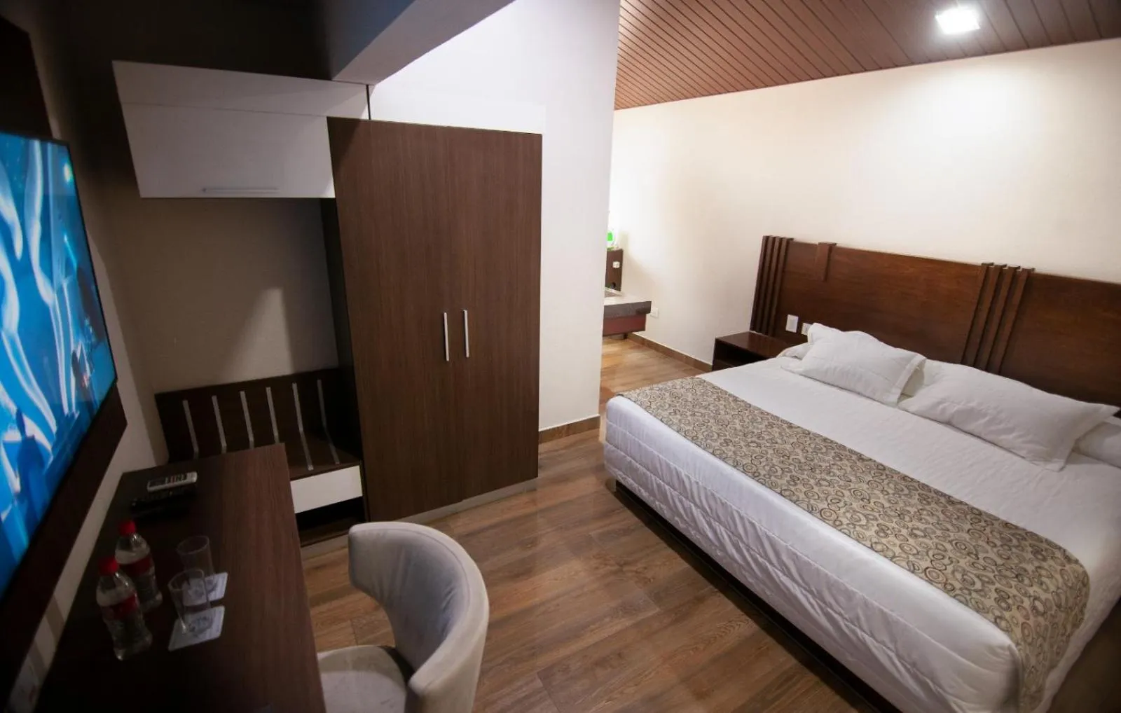 Bed in Hotel Sirari By Regina