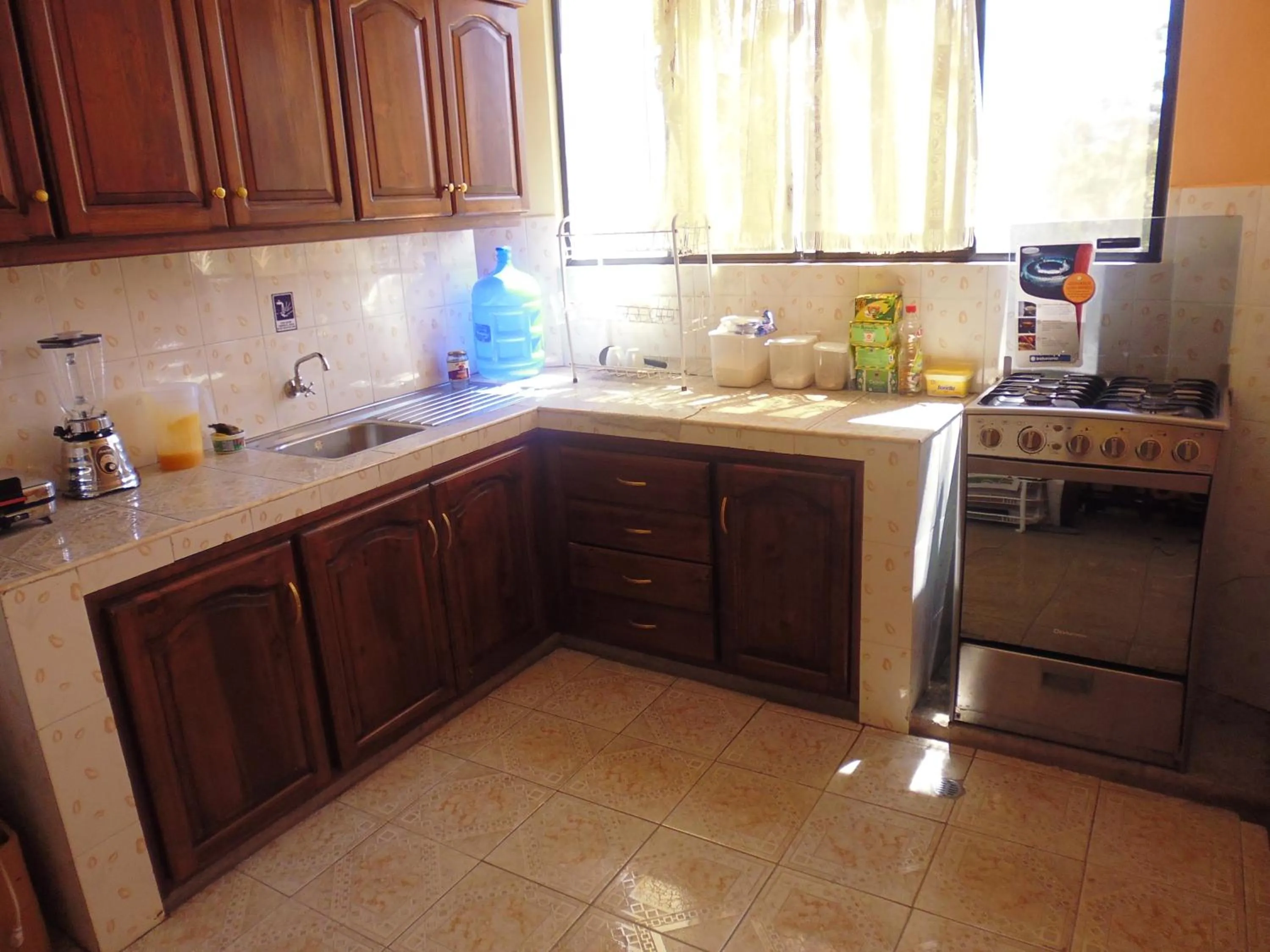 Kitchen or kitchenette in Hotel Residencial El Viajero