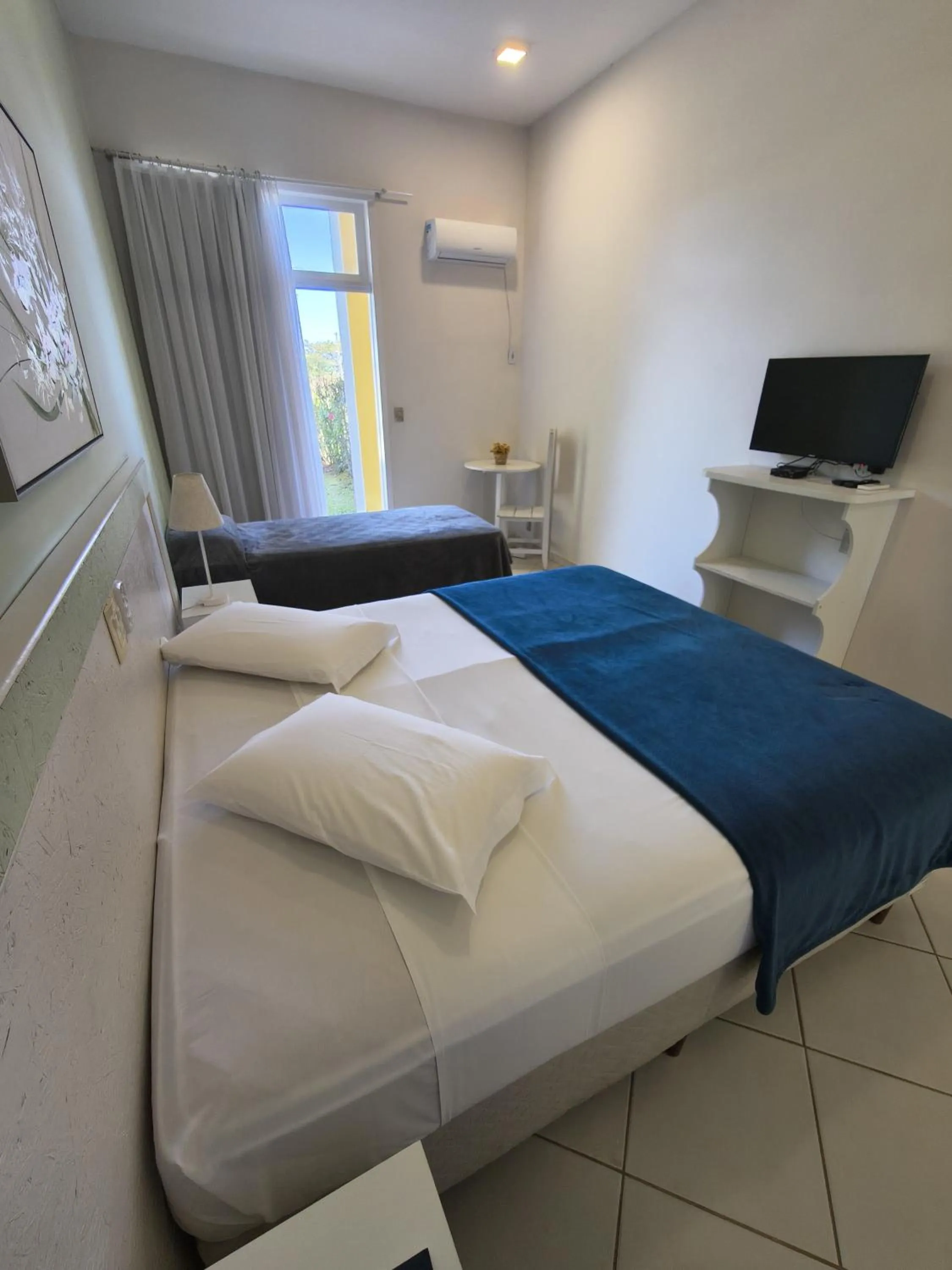 Photo of the whole room in Hotel Porto de Paz - Shantiniketan