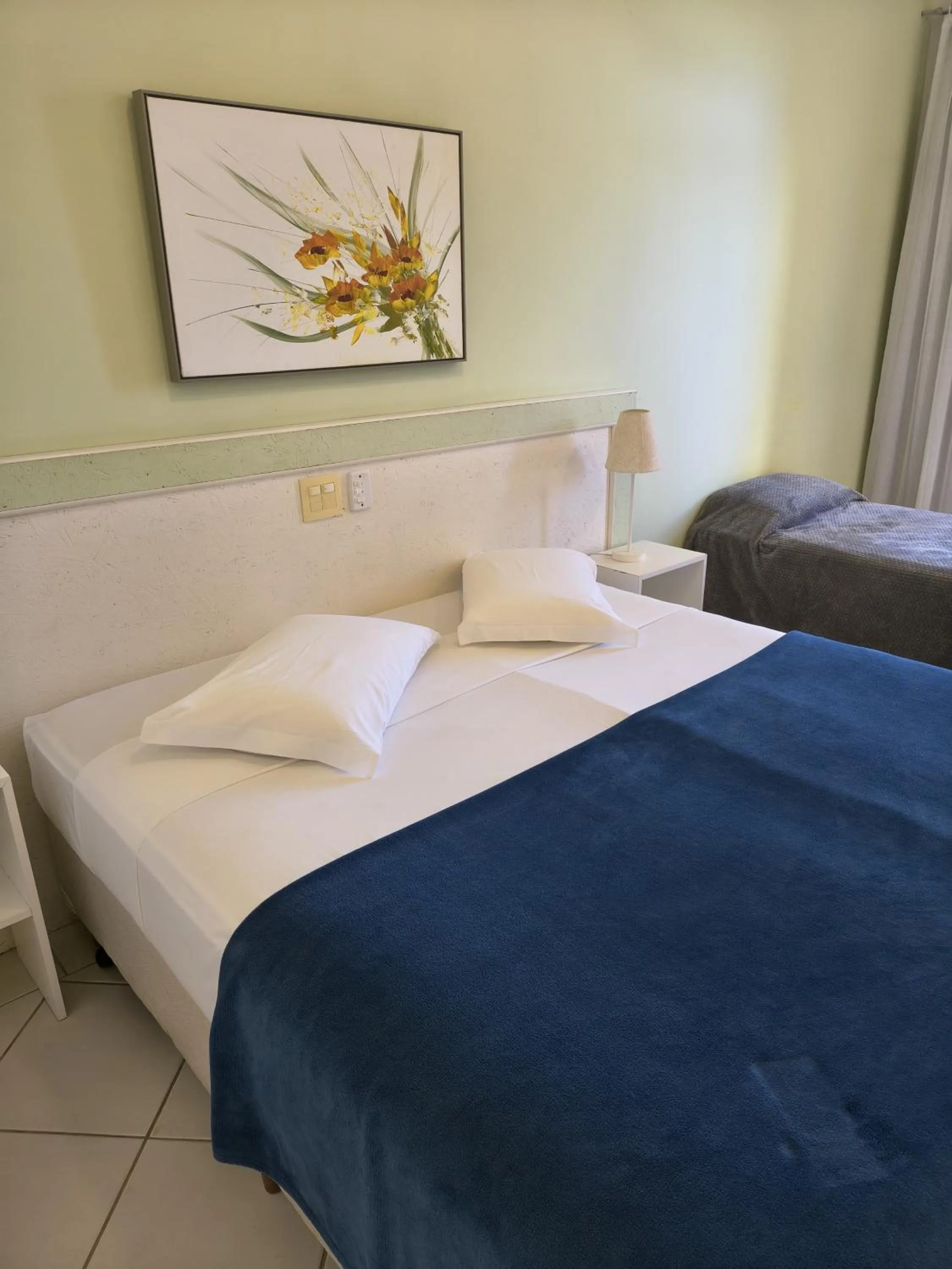 Bedroom in Hotel Porto de Paz - Shantiniketan