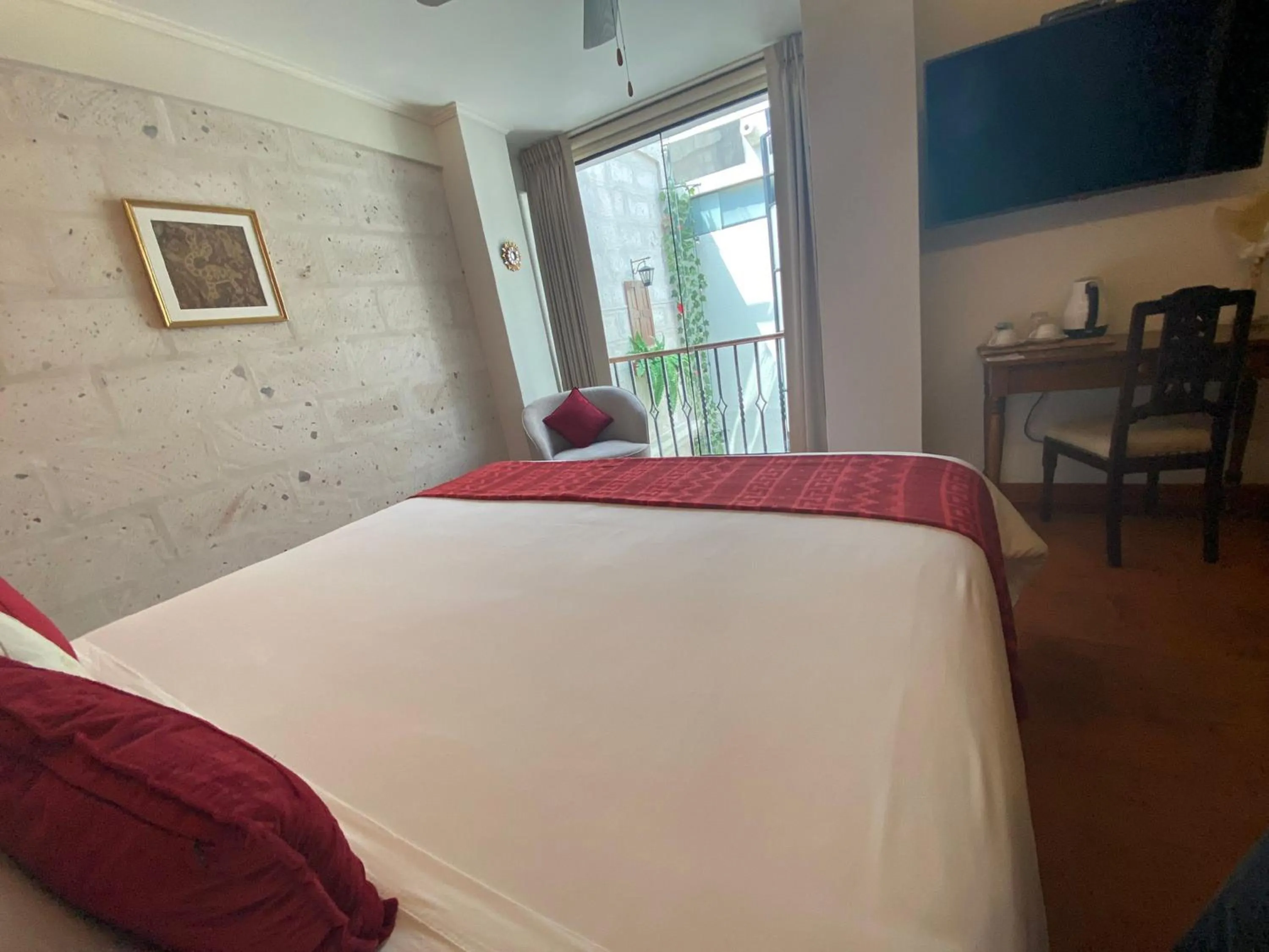 Bed in Katari Hotel at Plaza de Armas