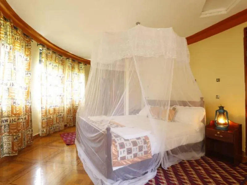 Bedroom, Bed in Top of the World Lodges Fort Portal