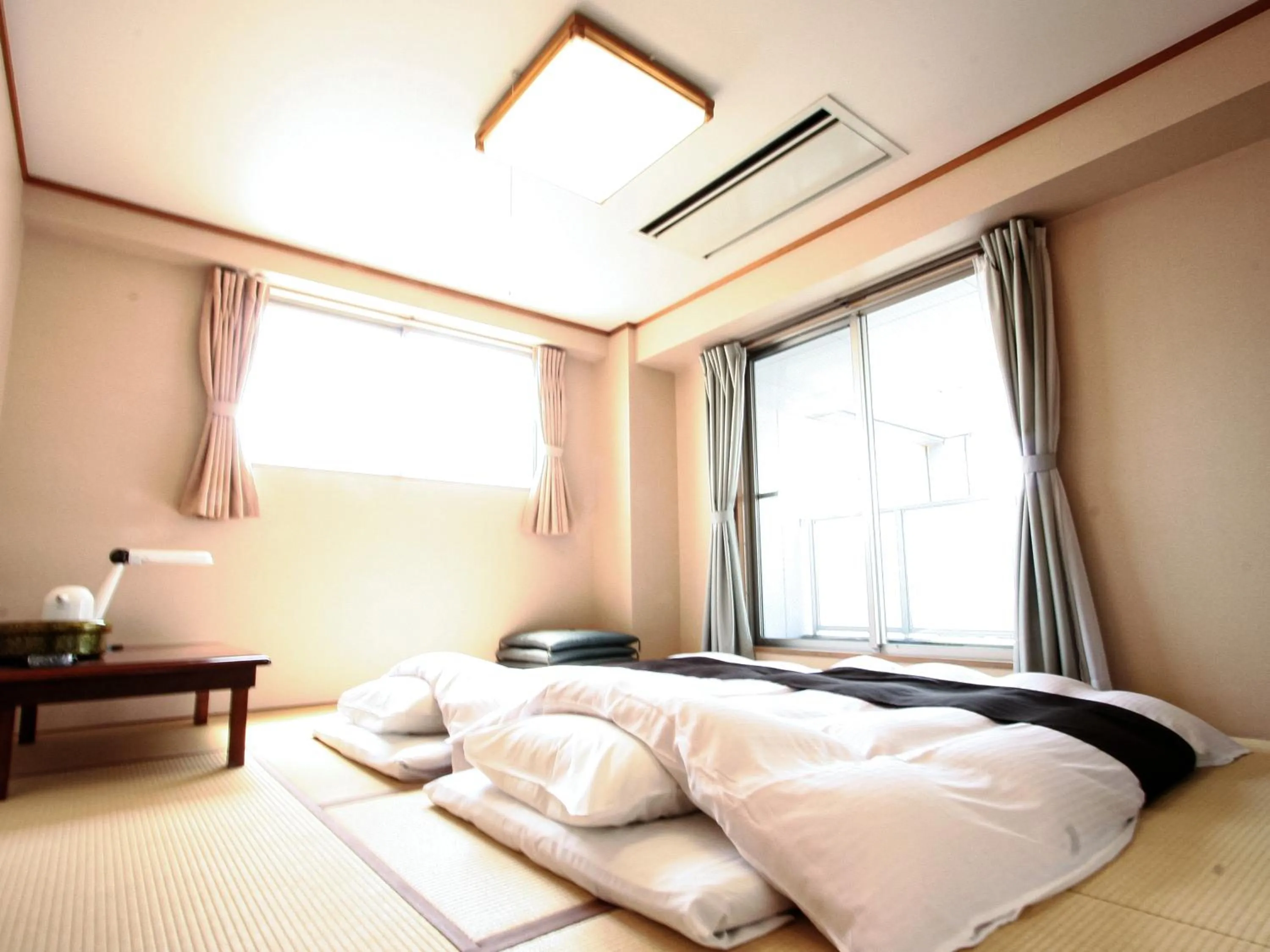 Photo of the whole room, Bed in Hotel Abest Kochi