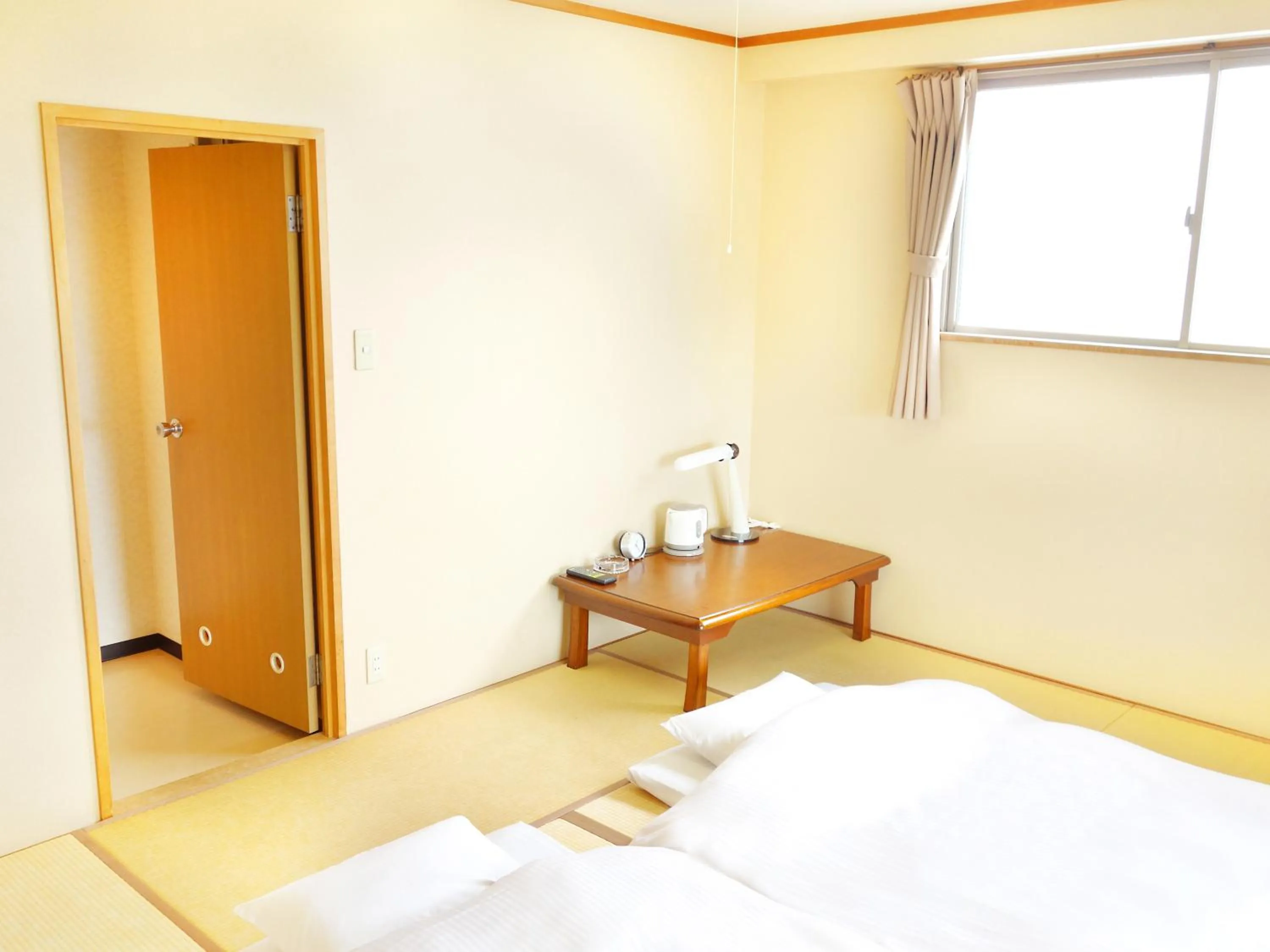 Photo of the whole room, Bed in Hotel Abest Kochi