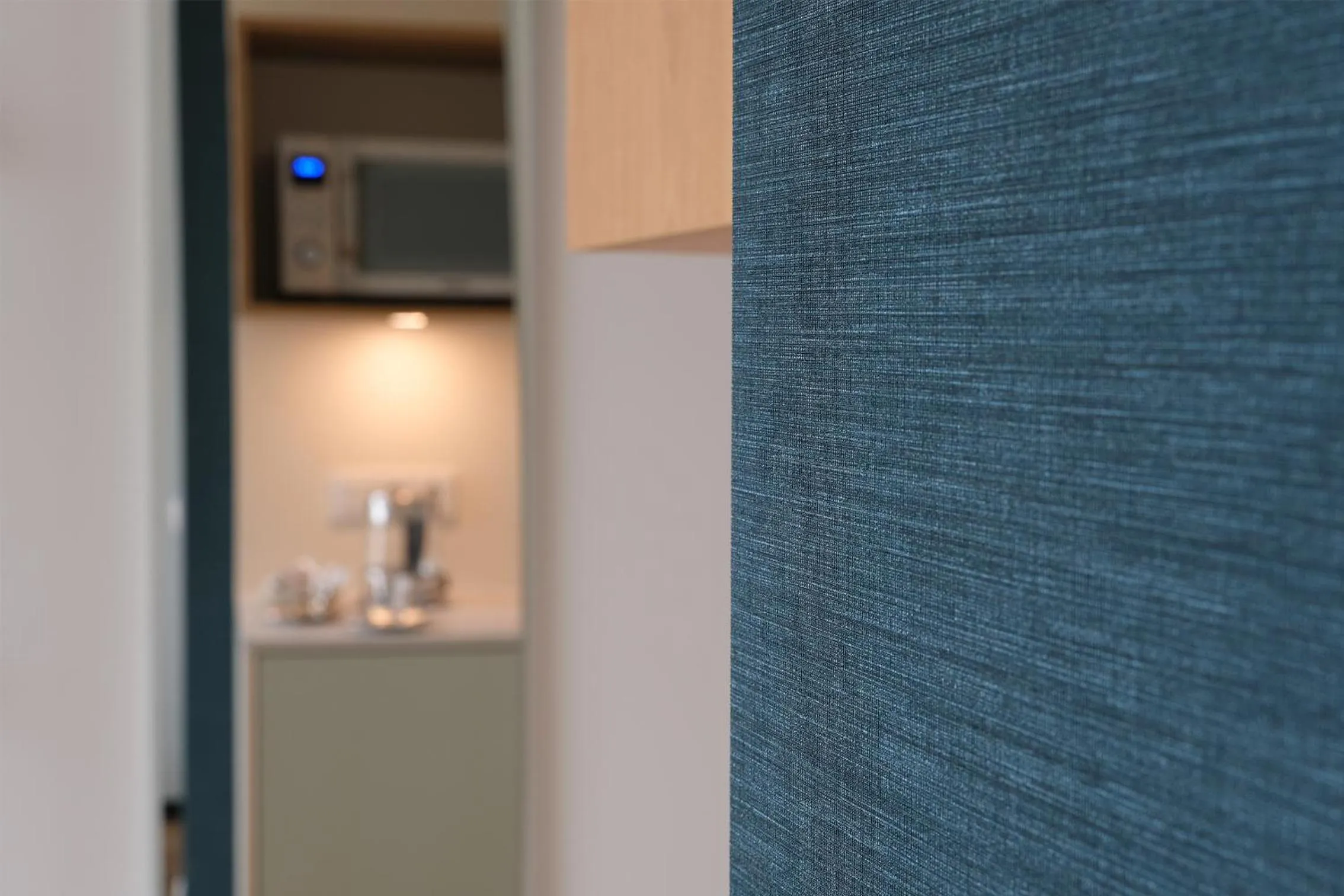 Kitchen or kitchenette in Hood House Kassel - volldigitales Serviced Apartment