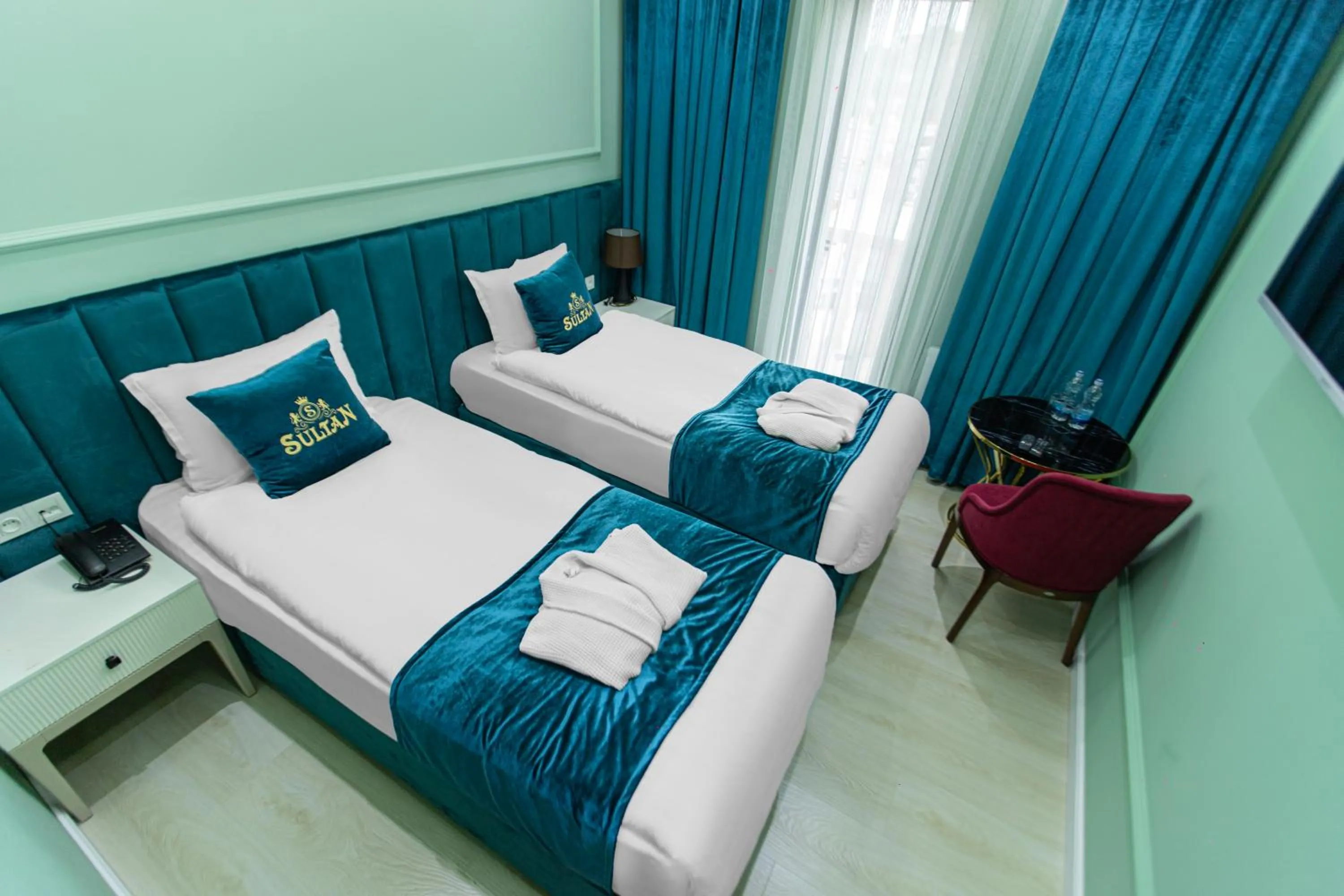 Bed in HOTEL SULTAN PALACE