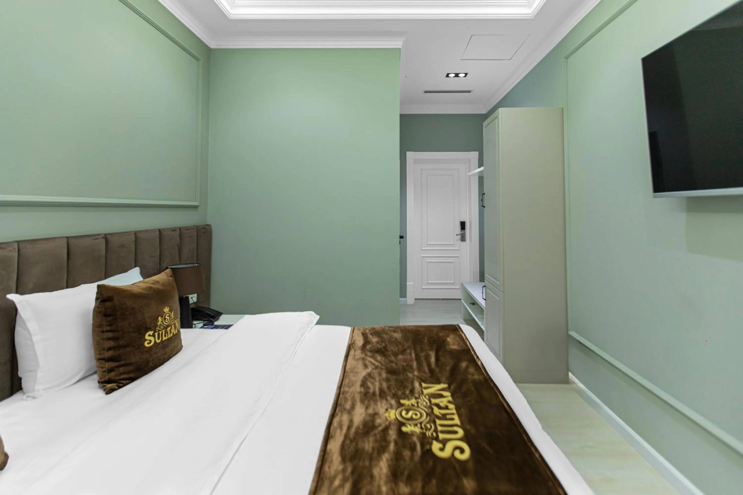 Bed in HOTEL SULTAN PALACE