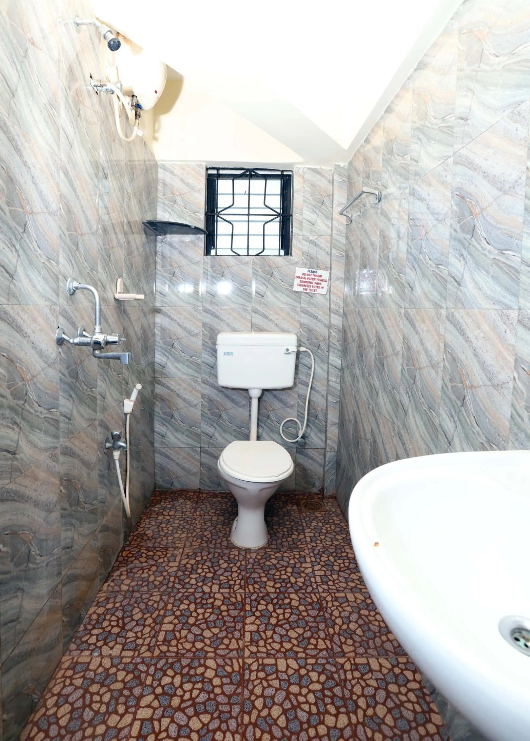 Shower in Morjim Sunset Hotel