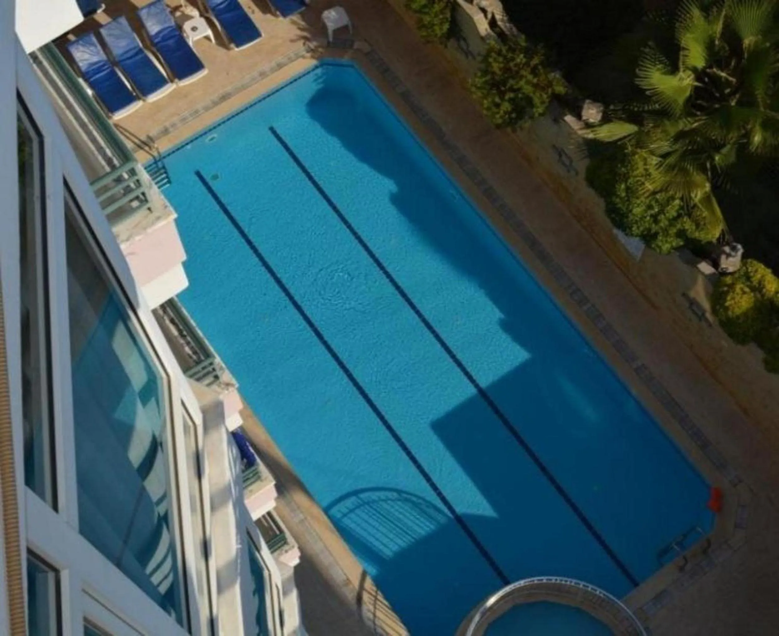 Swimming pool in Casa Cleo Suit Hotel