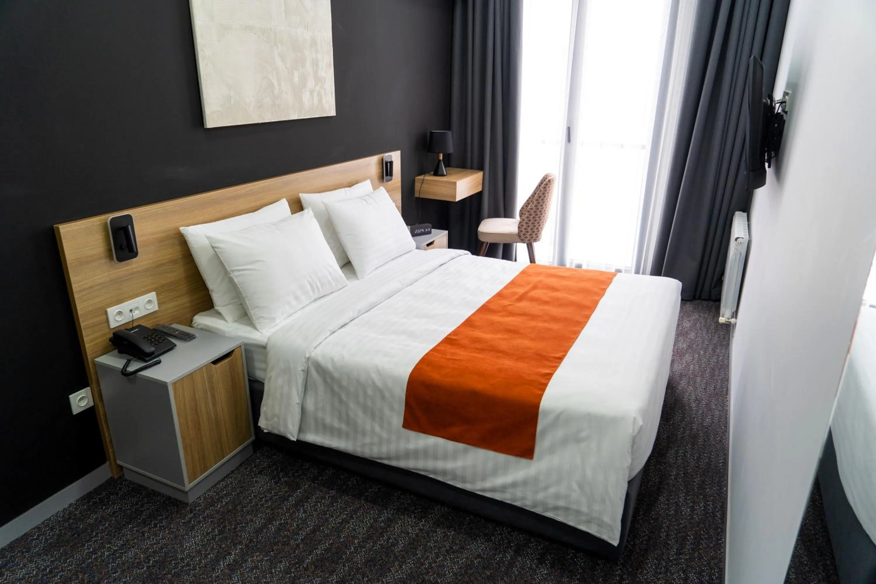 Bed in Nuovo Boutique Hotel