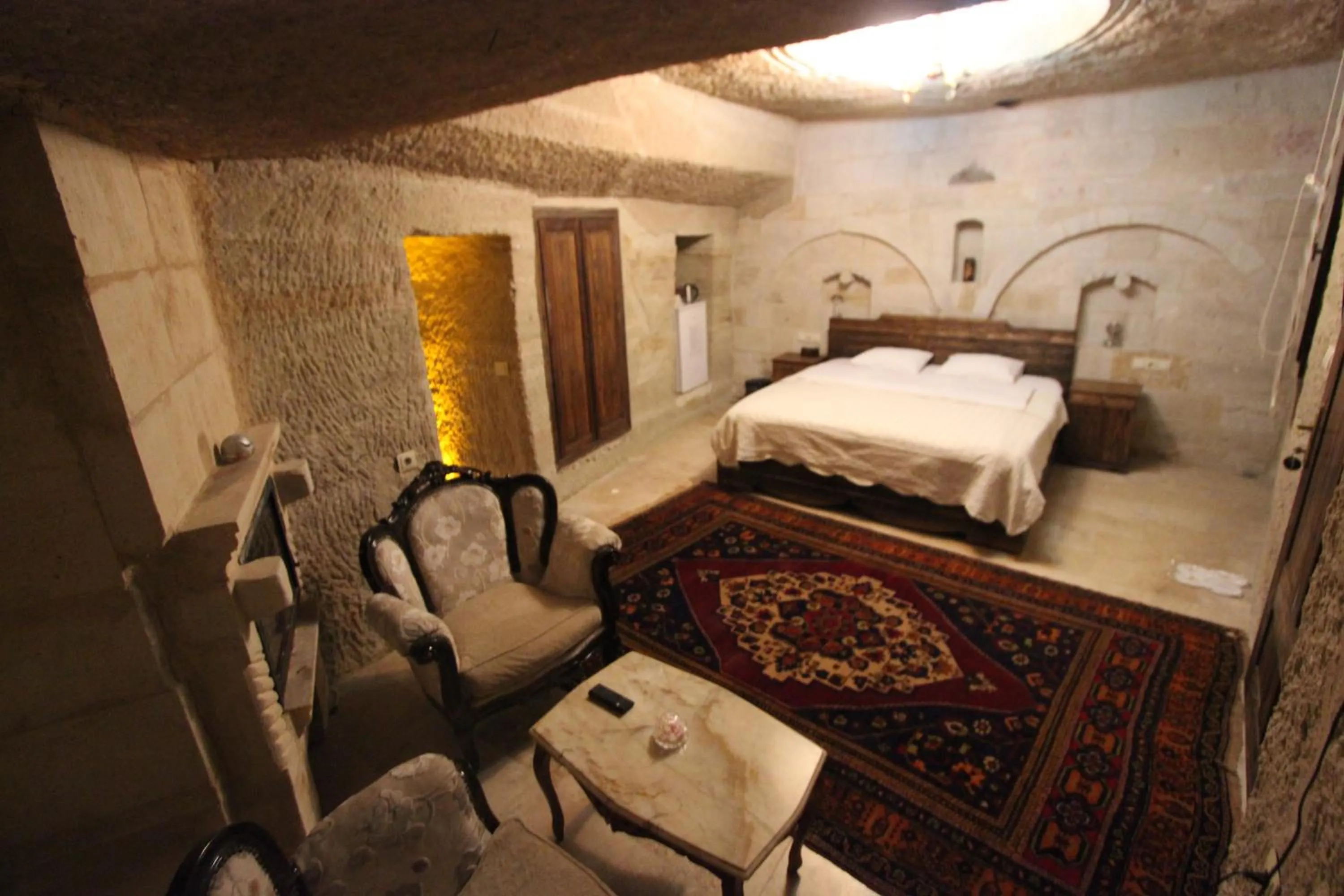 Photo of the whole room, Bed in Family Cave Suite Hotel