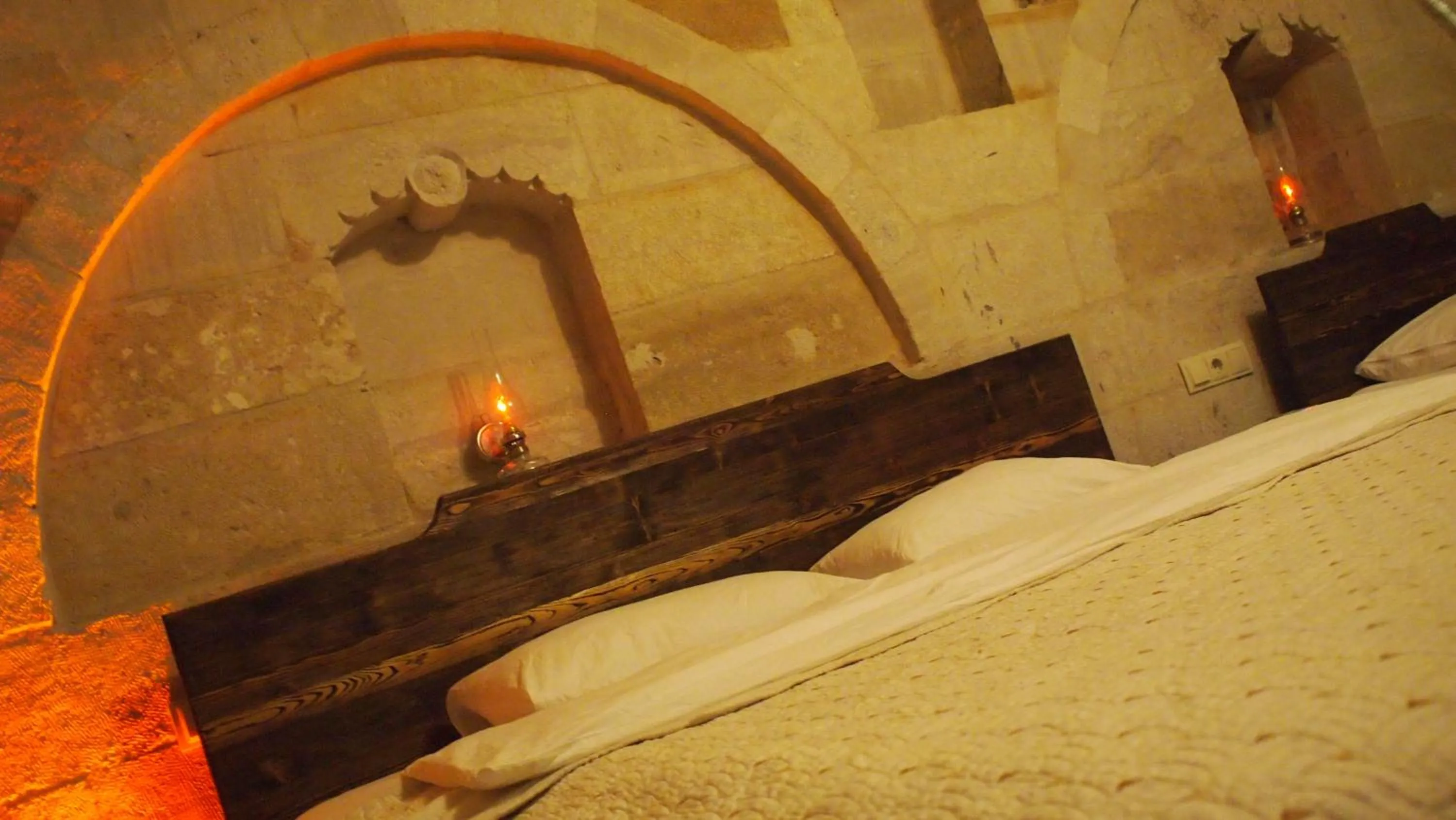 Bed in Family Cave Suite Hotel