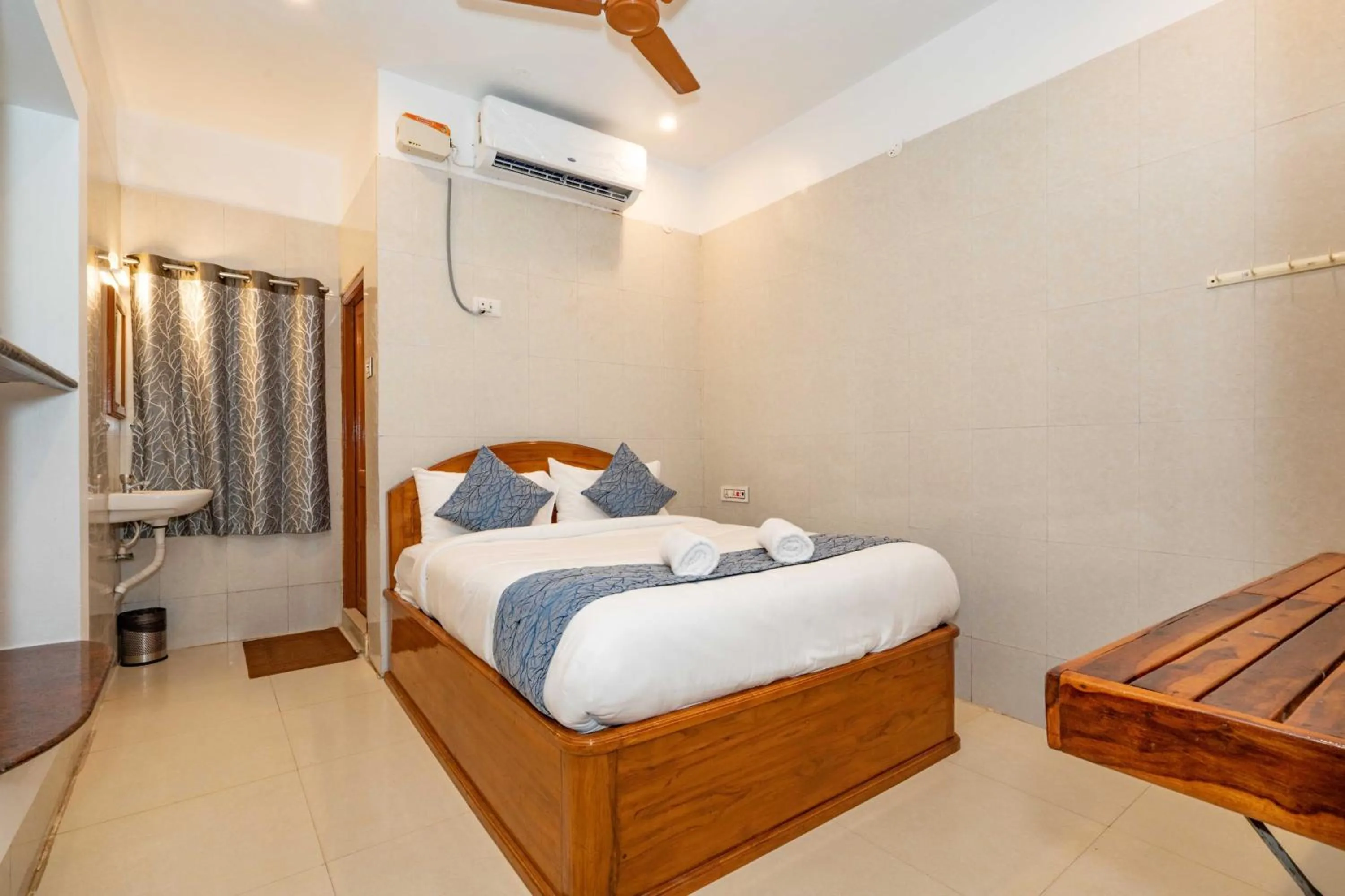 Bed in Hotel Arya Grand Rameswaram by Nimalan