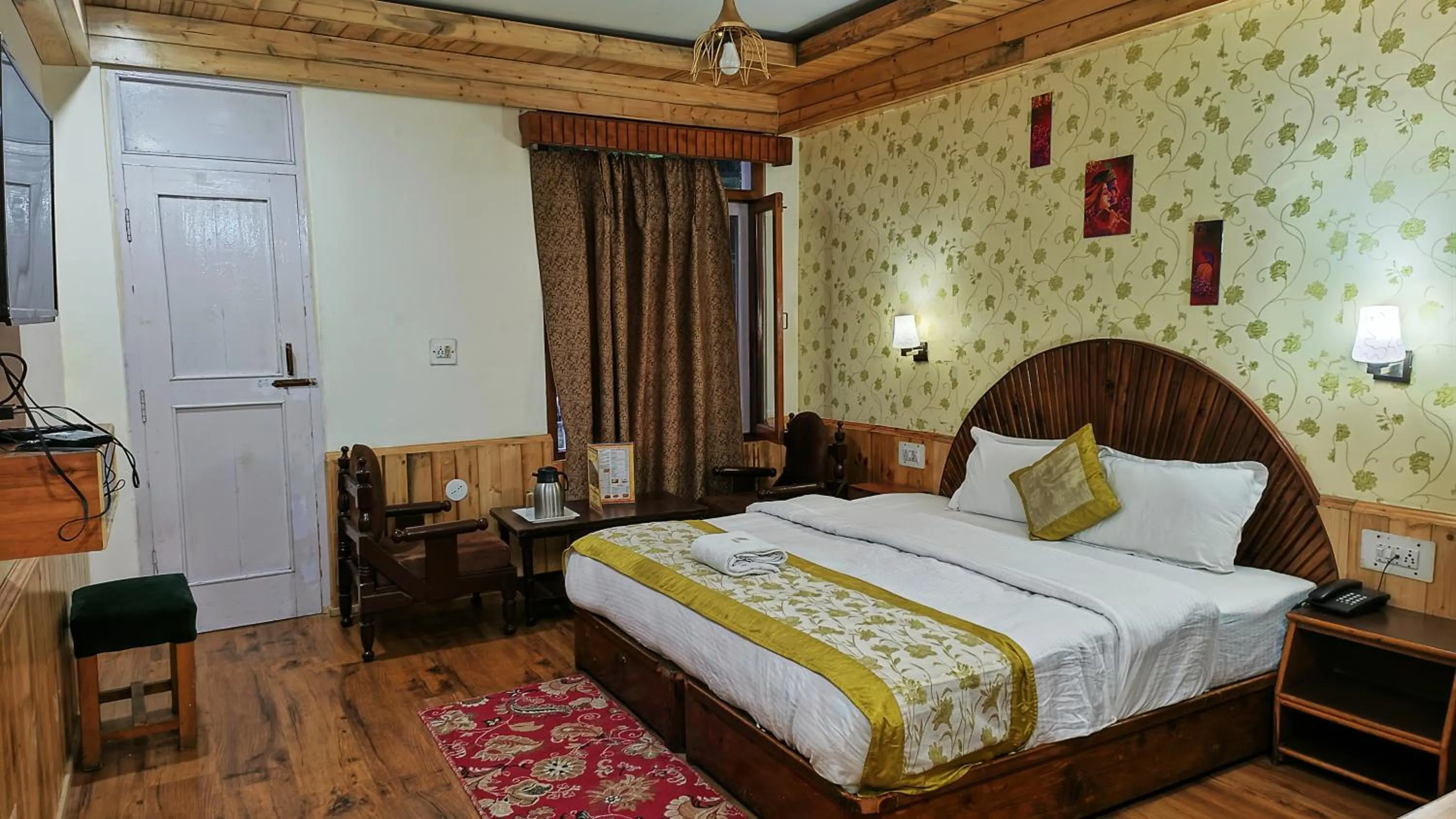 Bed in CS Shhandella Hotel