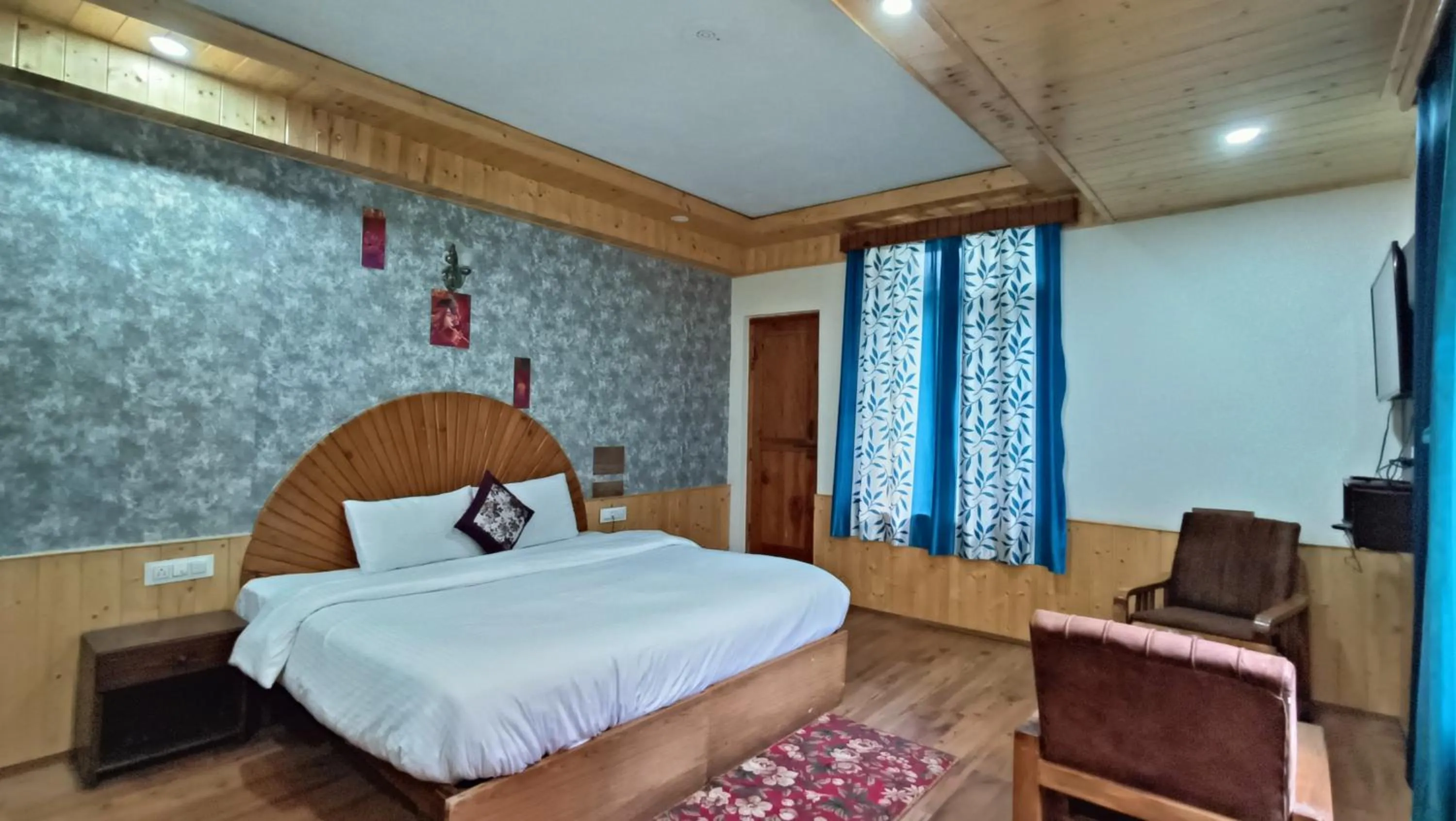 Bed in CS Shhandella Hotel