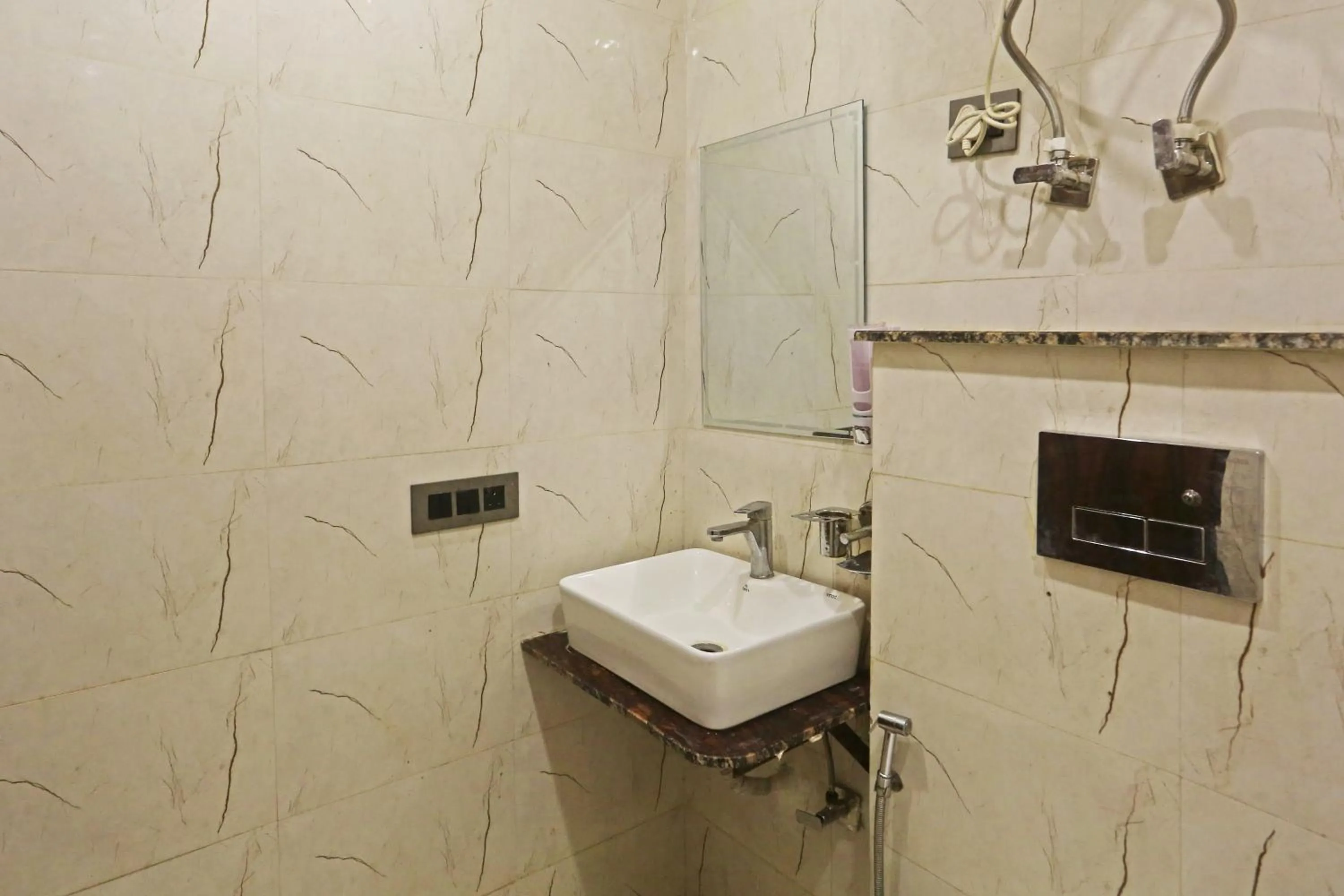 Bathroom in Hotel ECG Grand Inn-Near Delhi Airport free Airport Drop