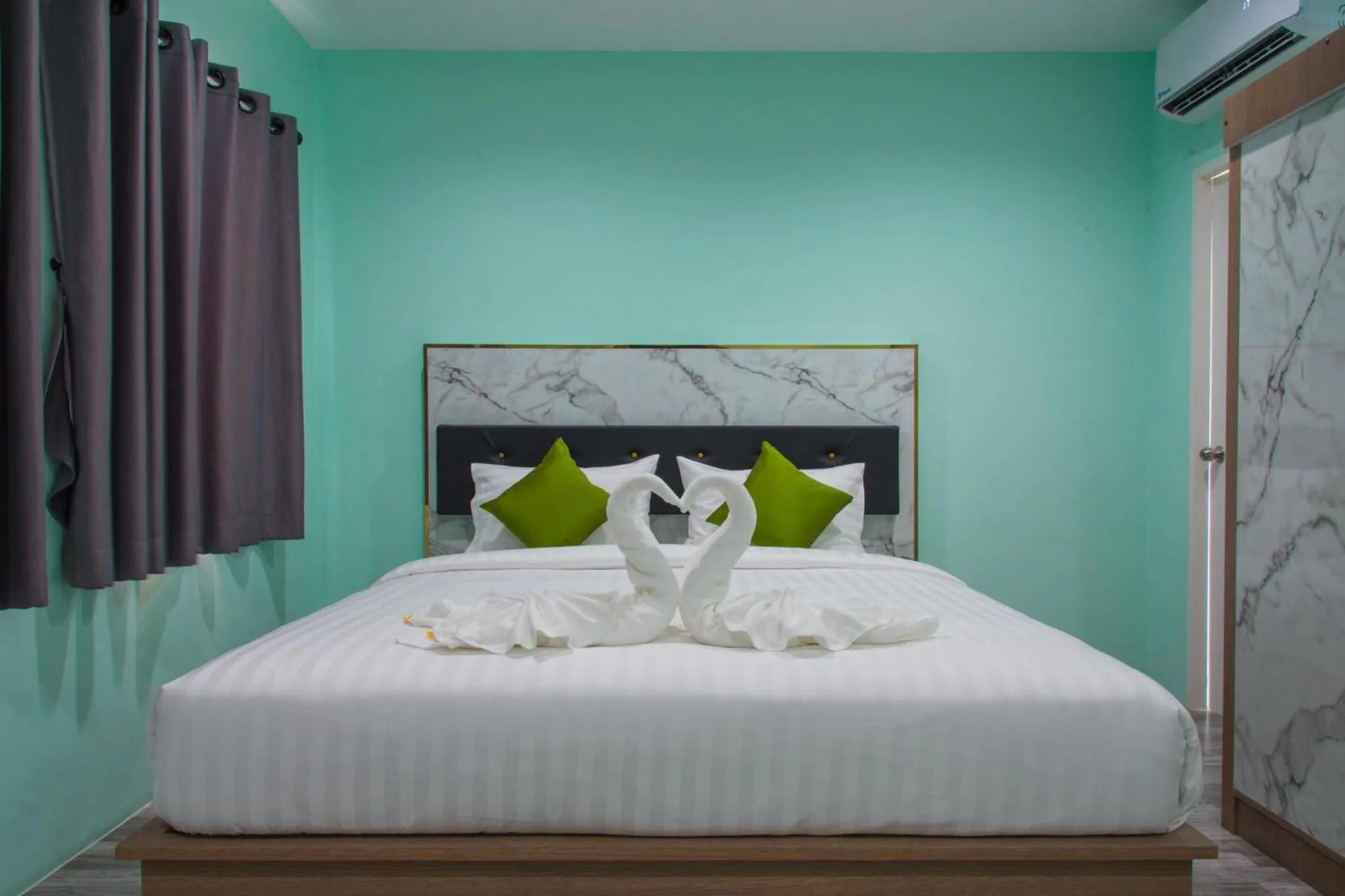 Bed in Anatasia Apartment Phuket