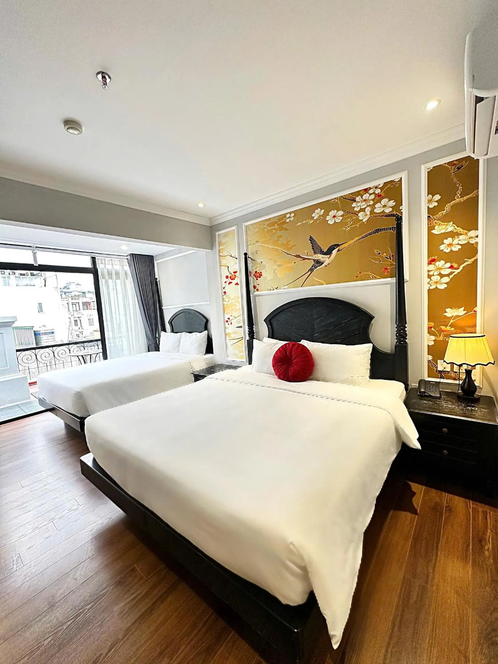 Living room, Bed in Amara Hanoi Hotel and Spa