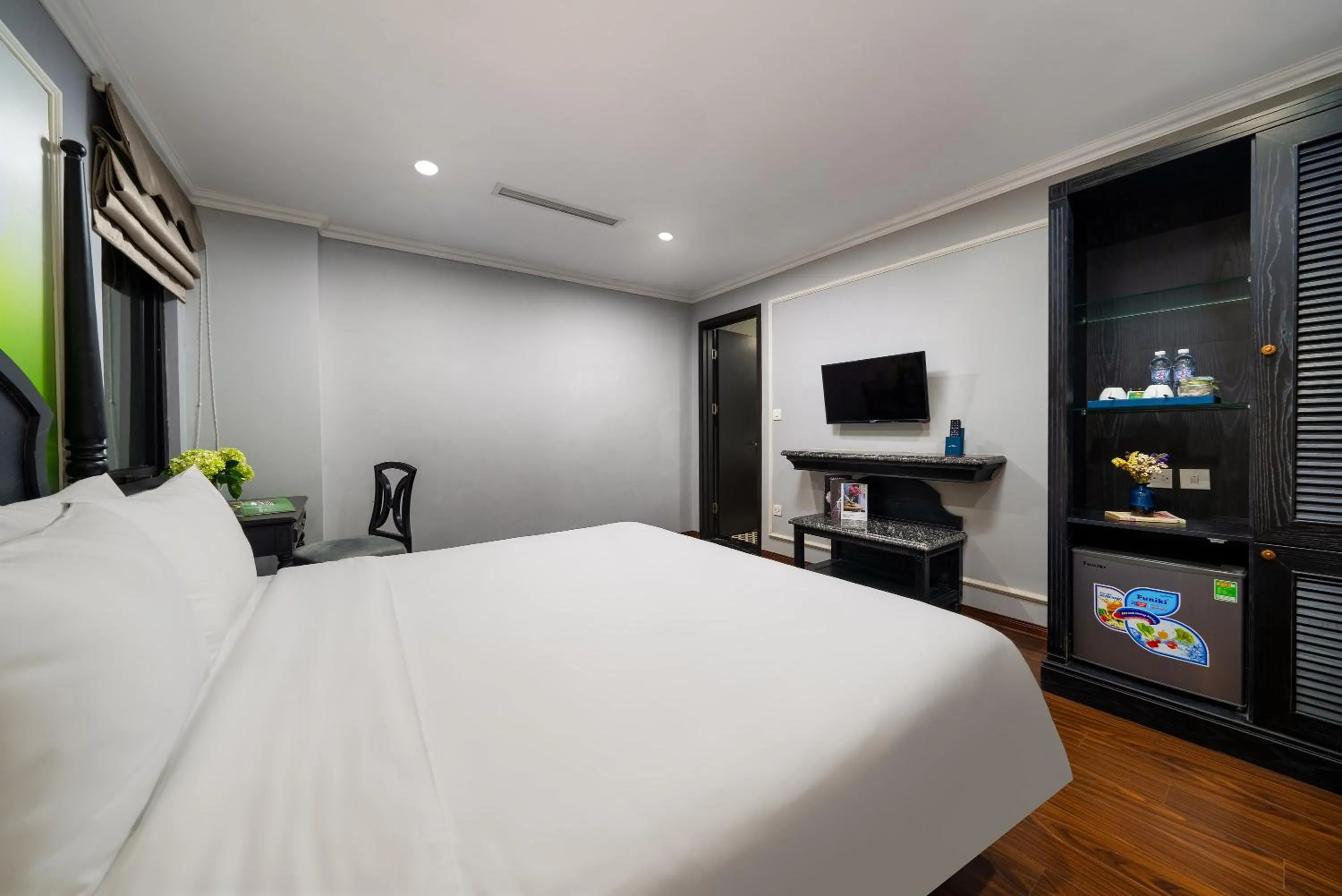 Photo of the whole room, Bed in Amara Hanoi Hotel and Spa