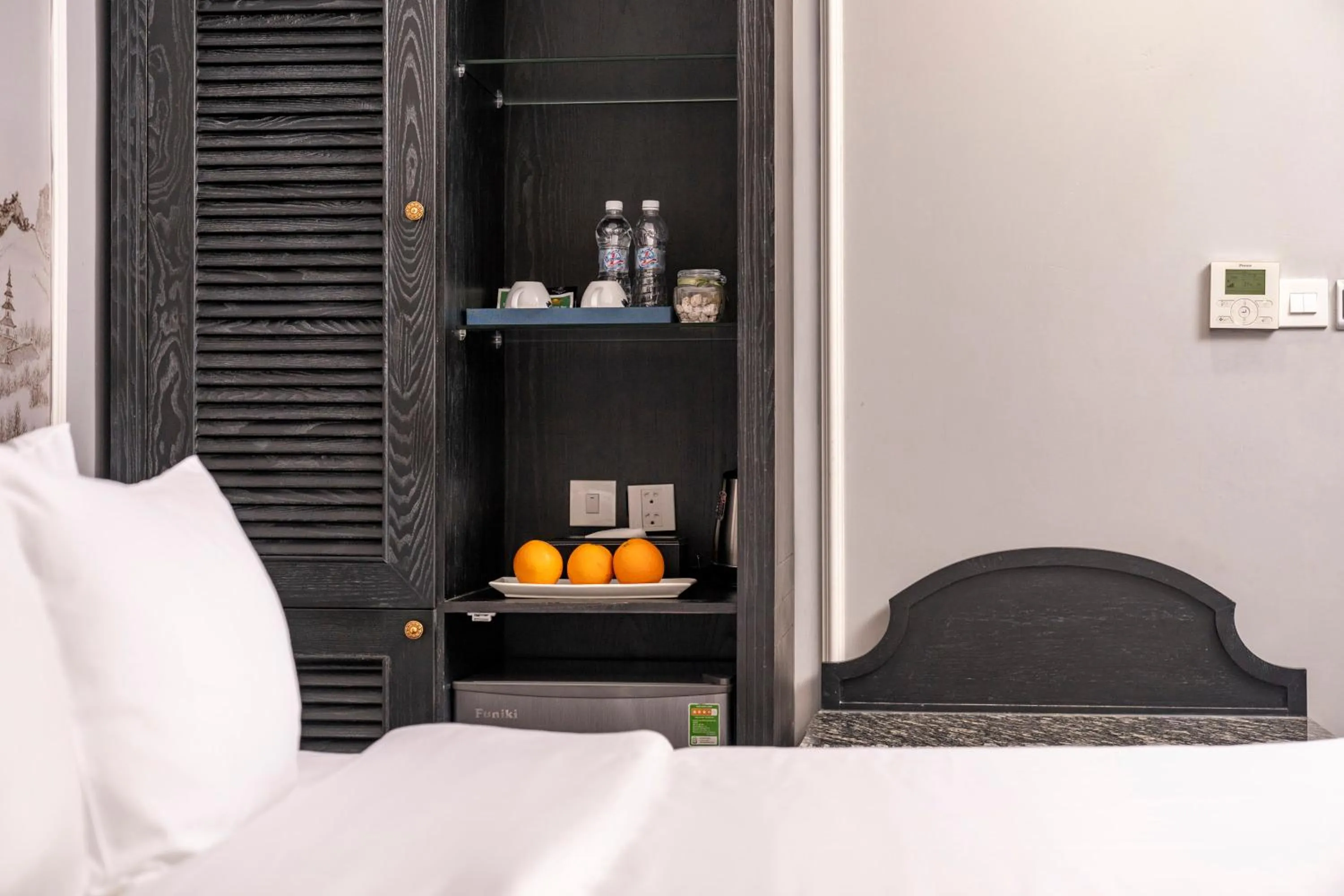 Photo of the whole room, Bed in Amara Hanoi Hotel and Spa