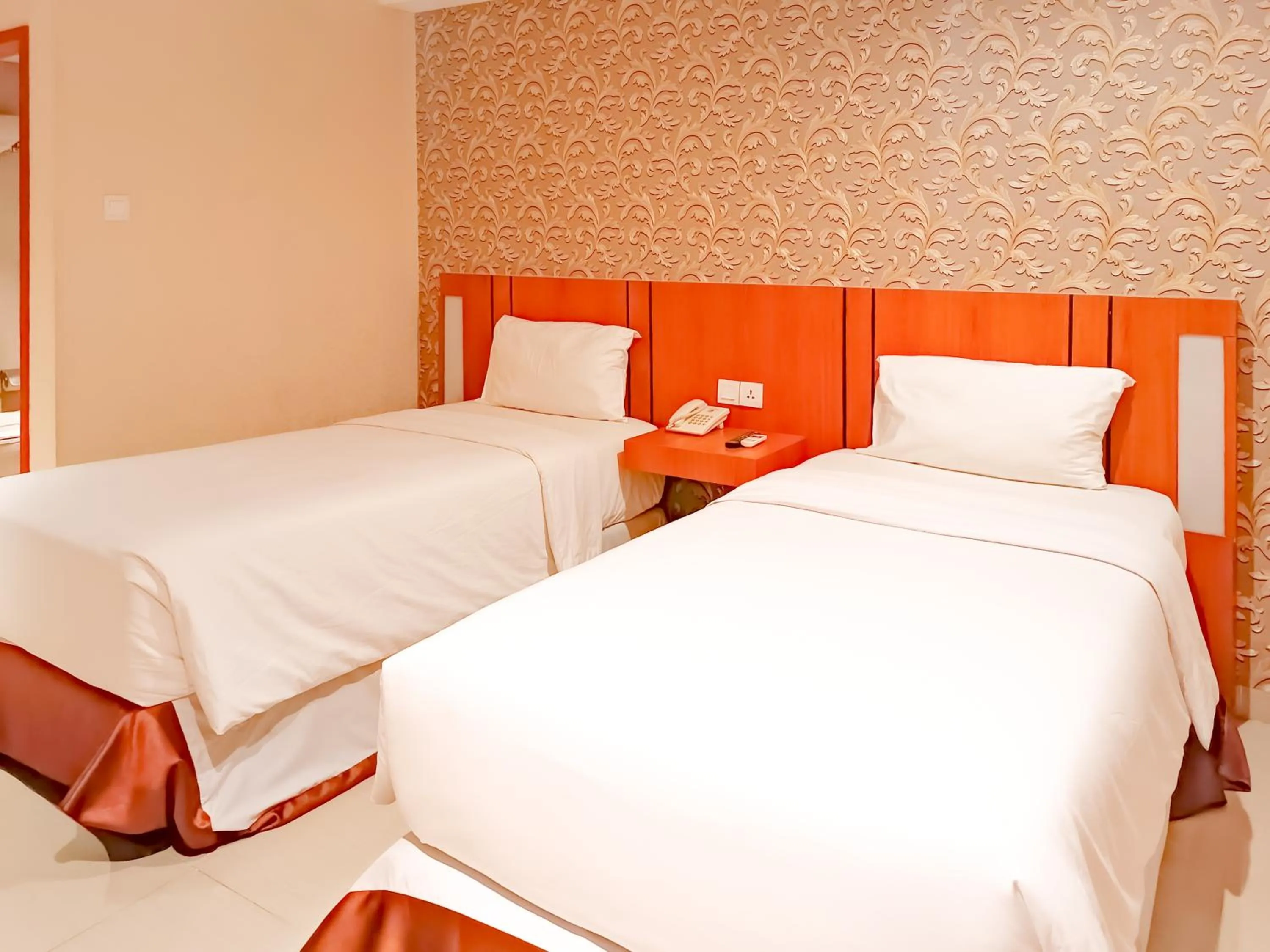 Bed in Portola Arabia Hotel Banda Aceh