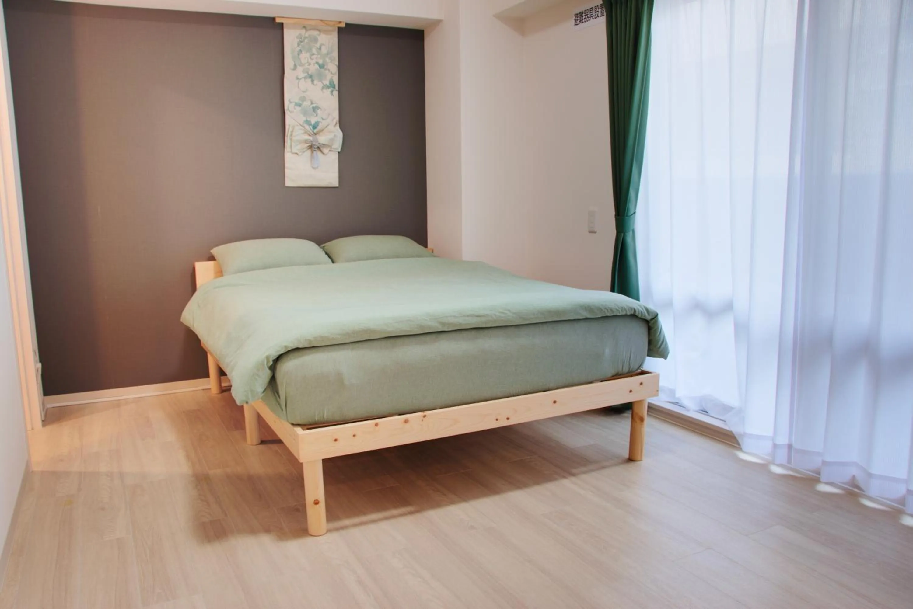 Bed in Island Stay Izumizaki Hotel