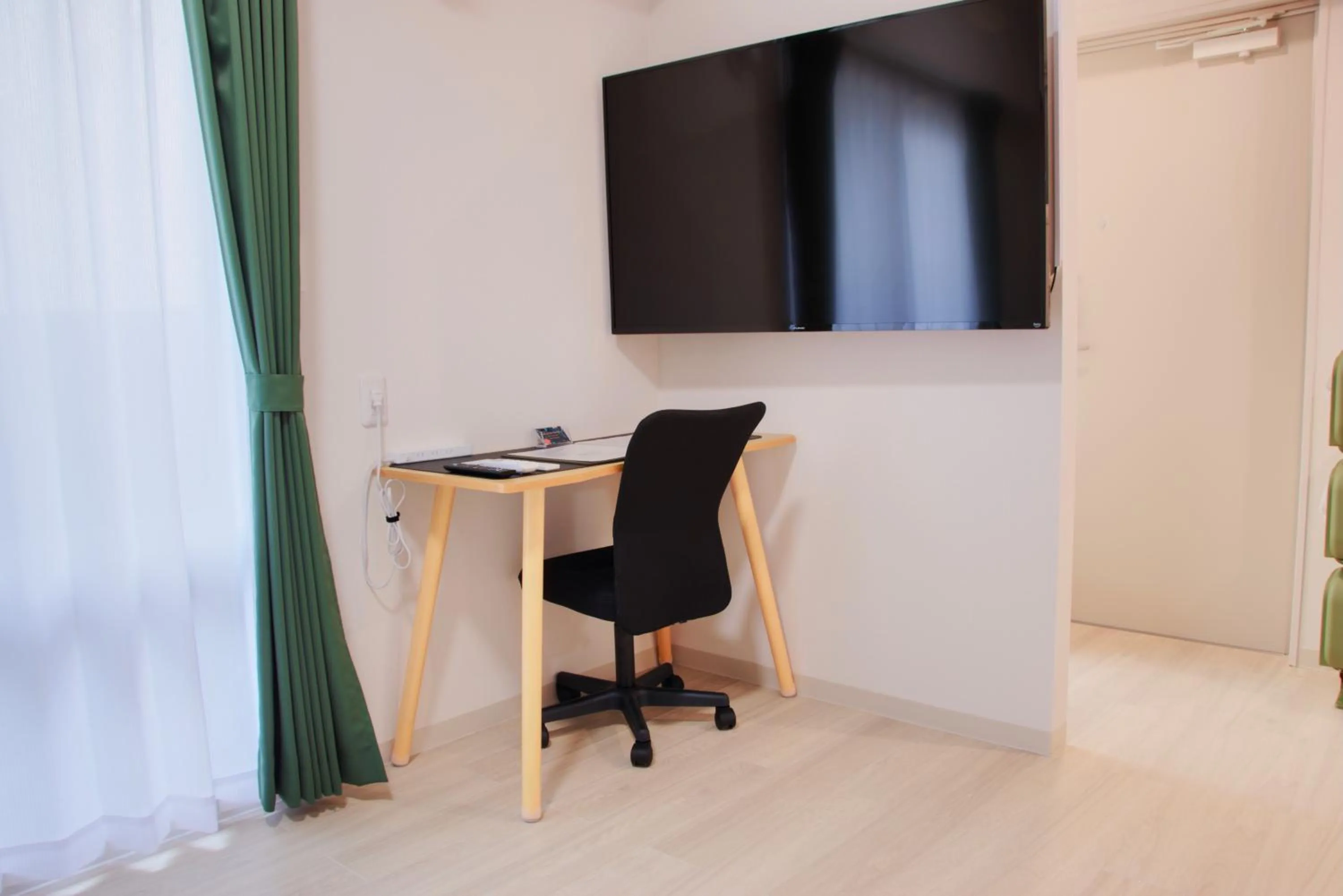 TV and multimedia in Island Stay Izumizaki Hotel