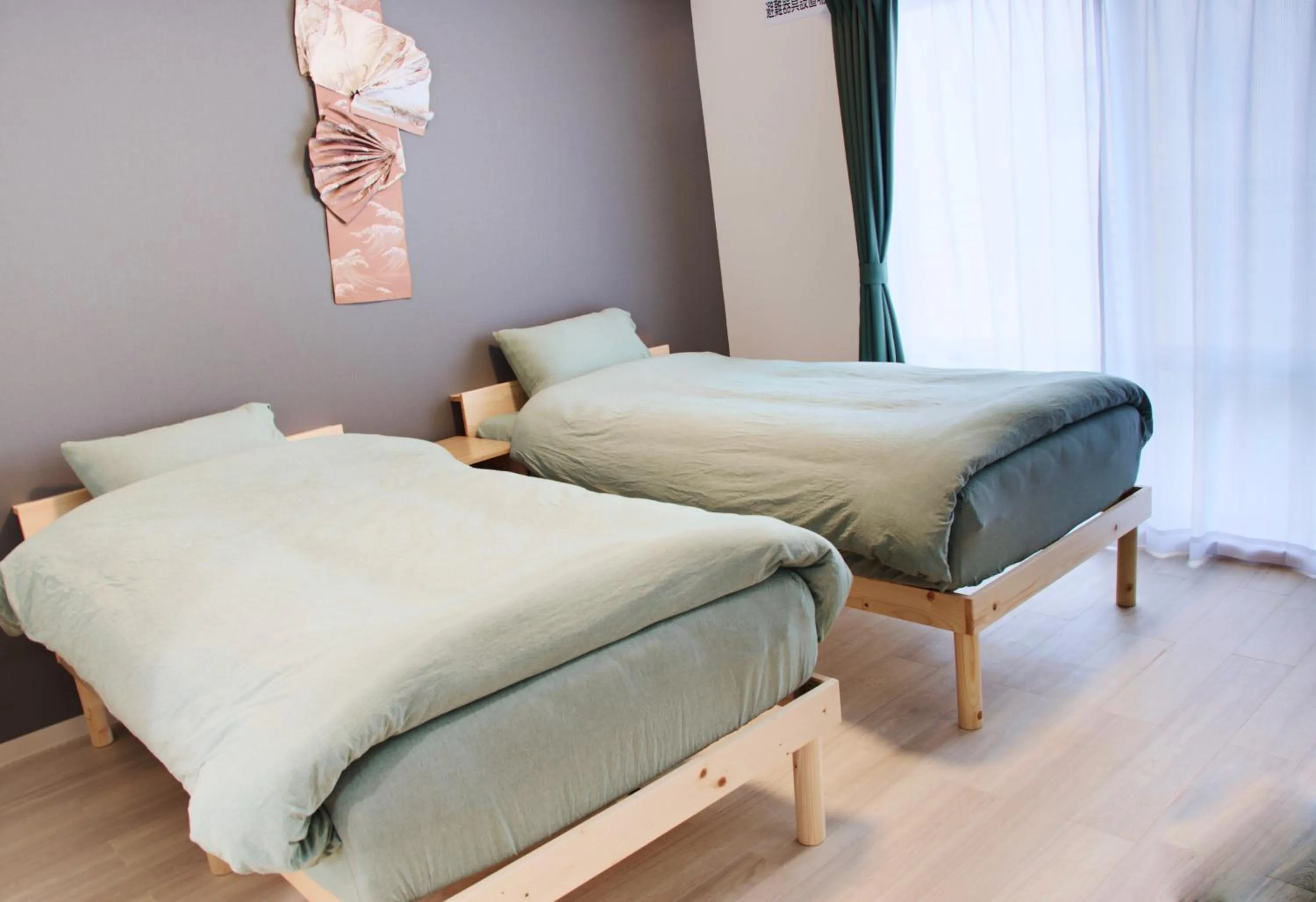 Bed in Island Stay Izumizaki Hotel