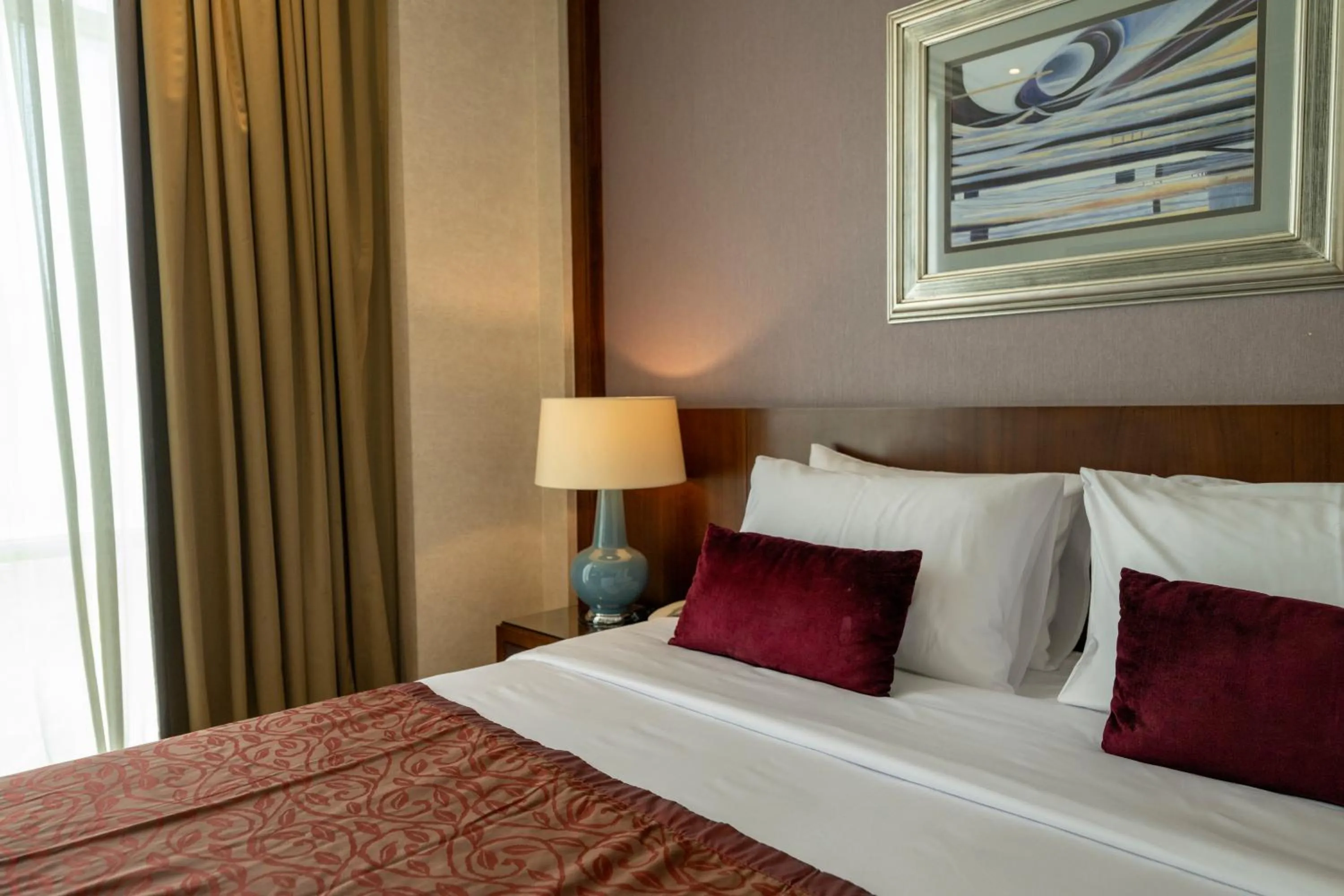 Bed in SAJA By Warwick Makkah Hotel