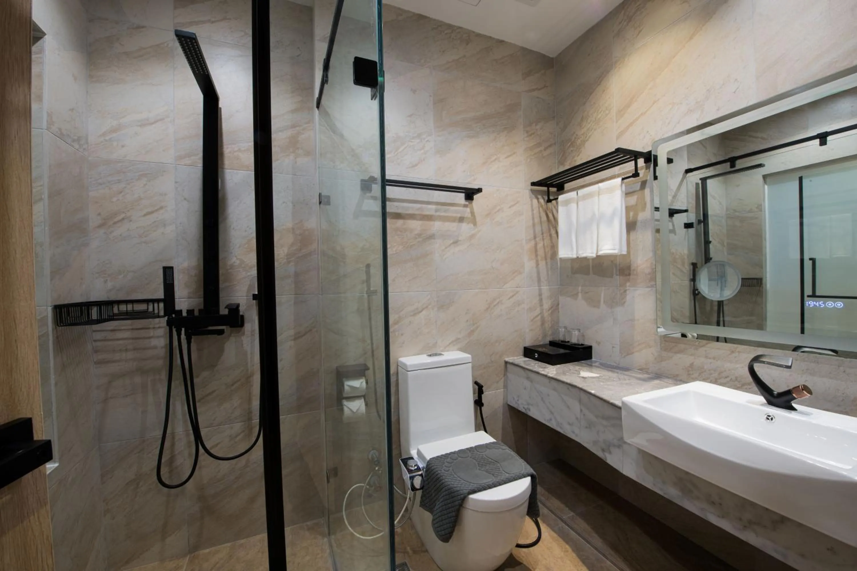 Bathroom in Grand InHotel Kota Kinabalu