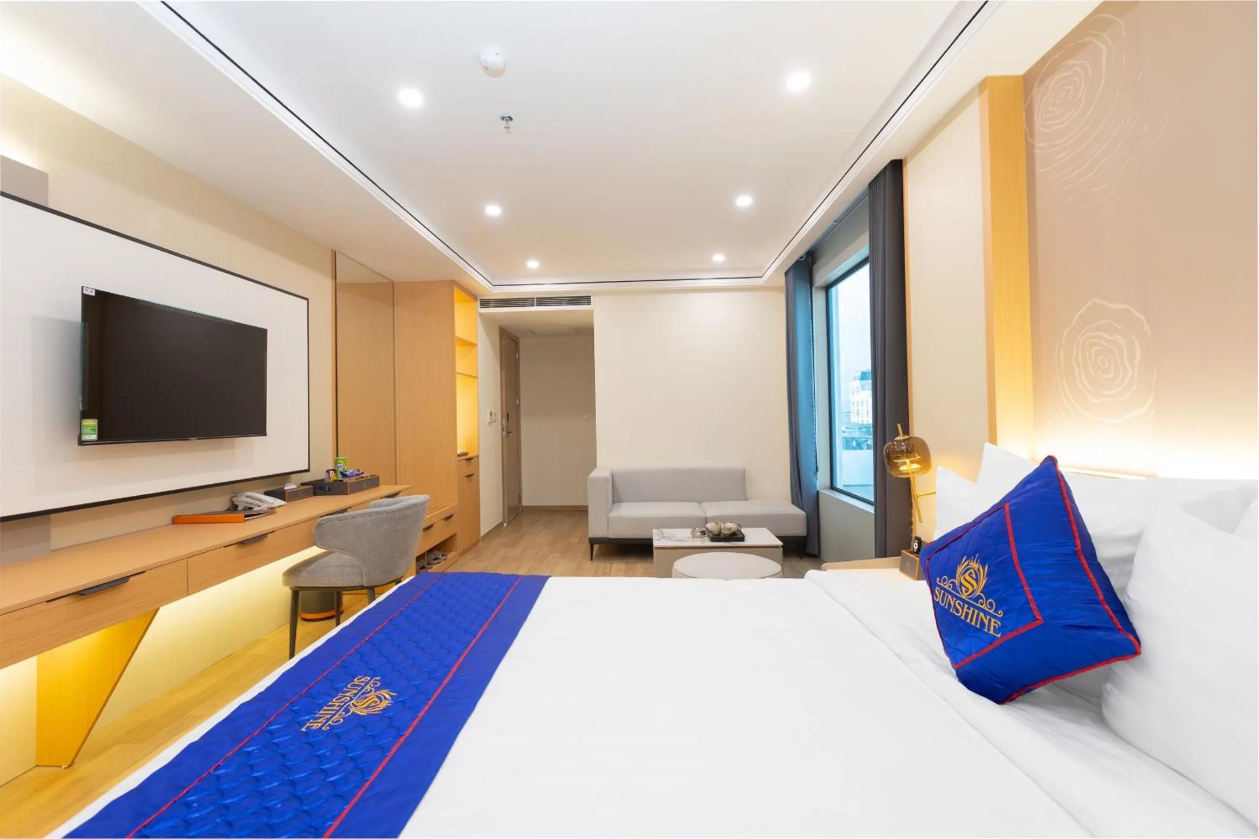 Bed in Sunshine Apartment Hotel