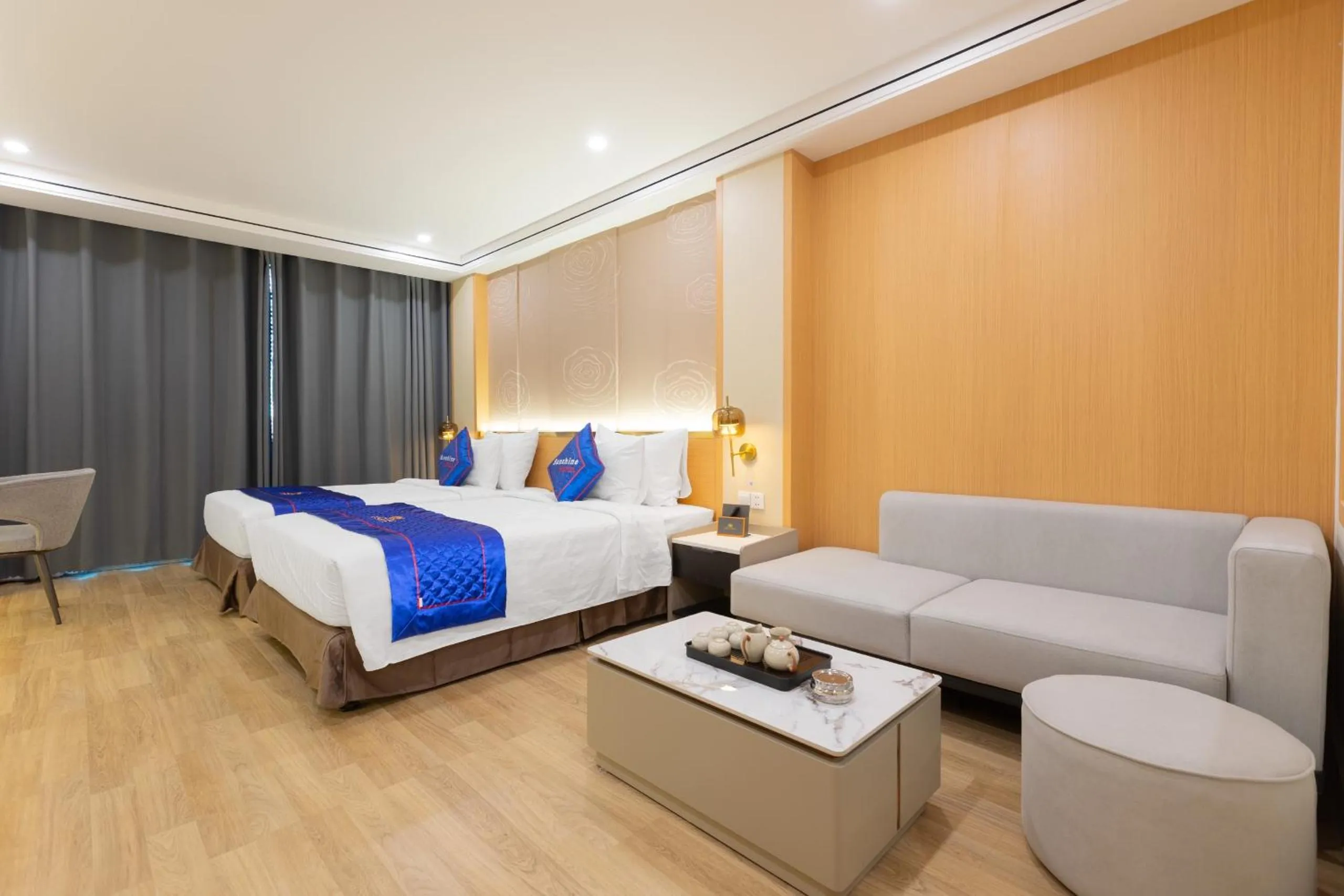 Bed in Sunshine Apartment Hotel