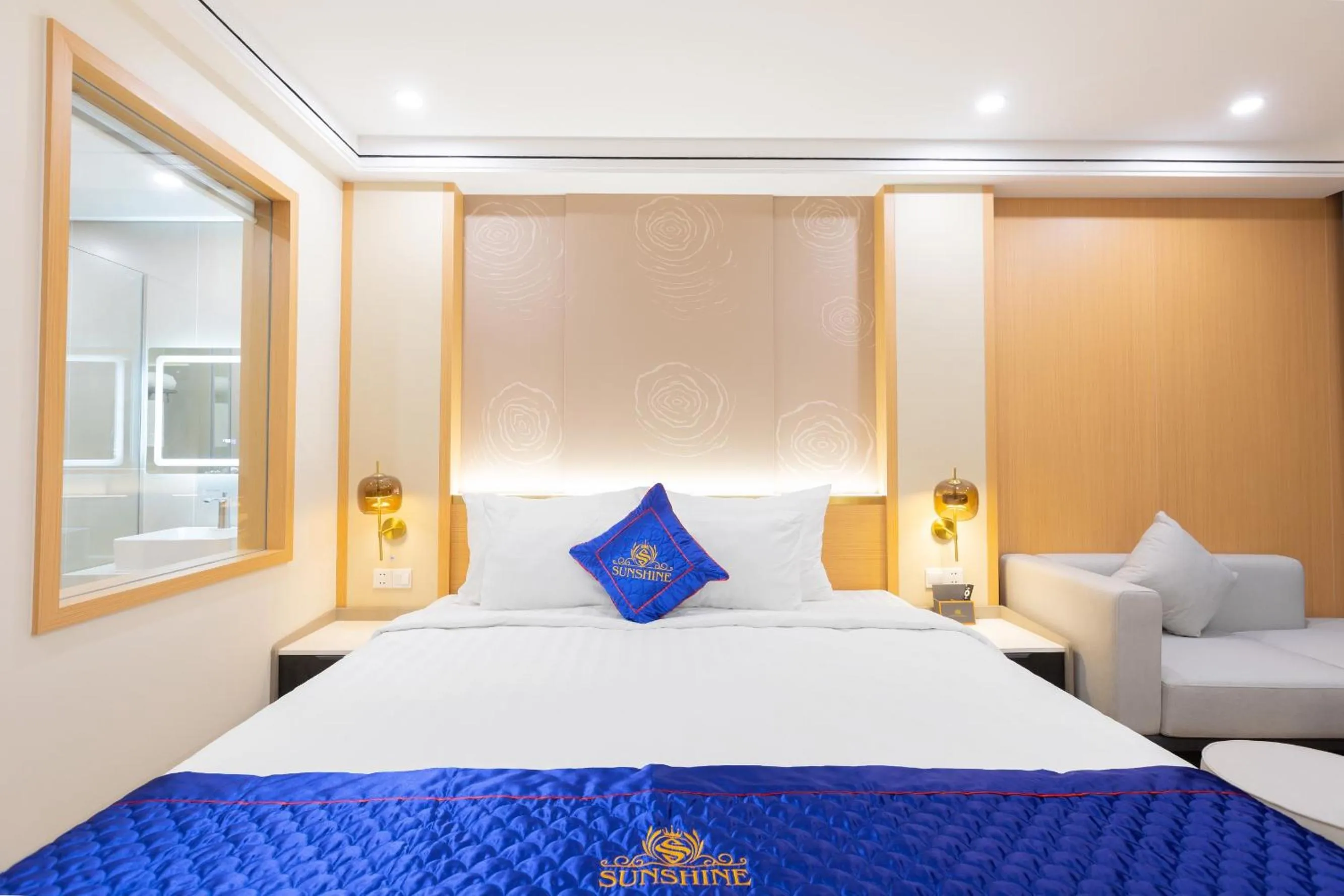 Bed in Sunshine Apartment Hotel