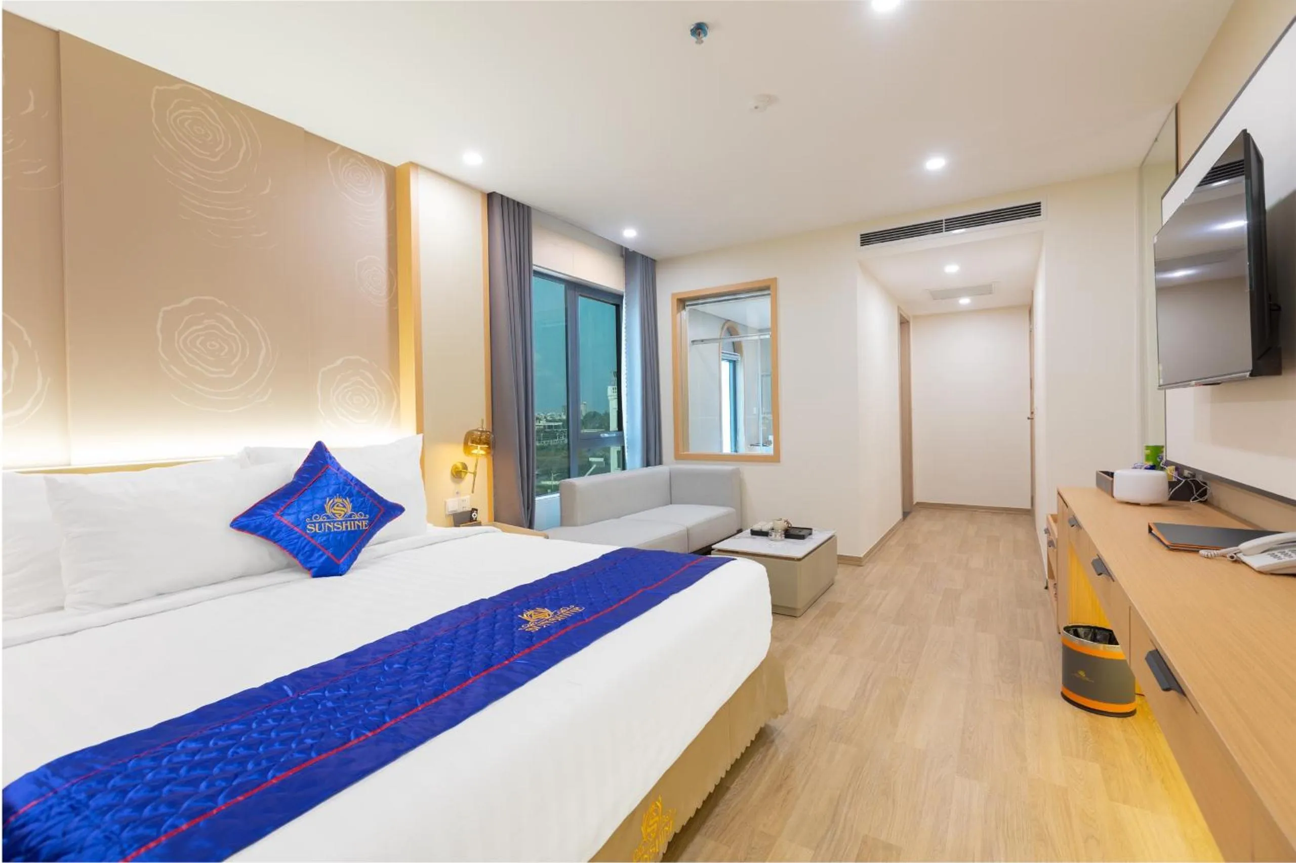 Communal lounge/ TV room, Bed in Sunshine Apartment Hotel