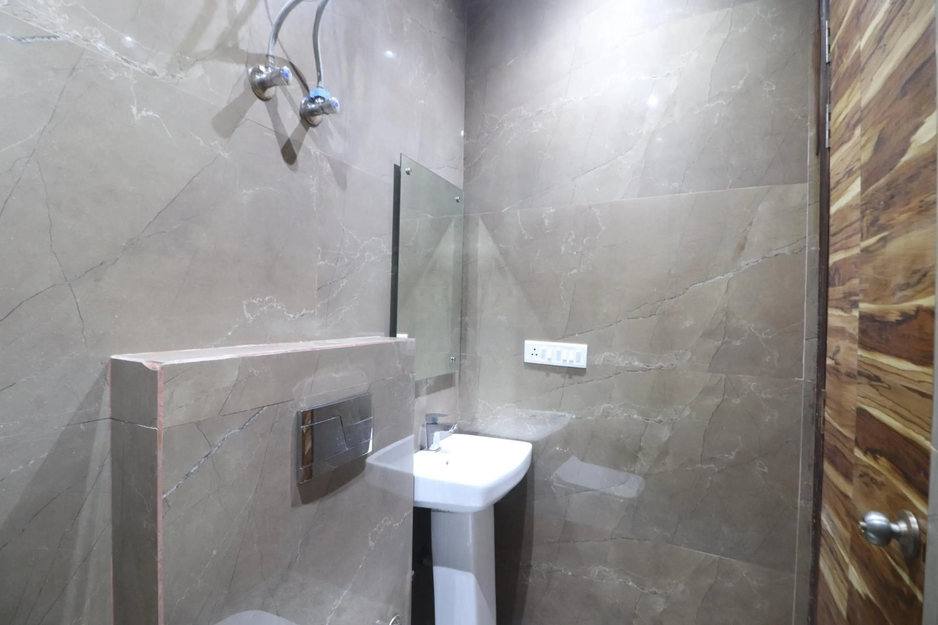 Shower in Twamev couple Friendly Rajouri garden by The Arrow