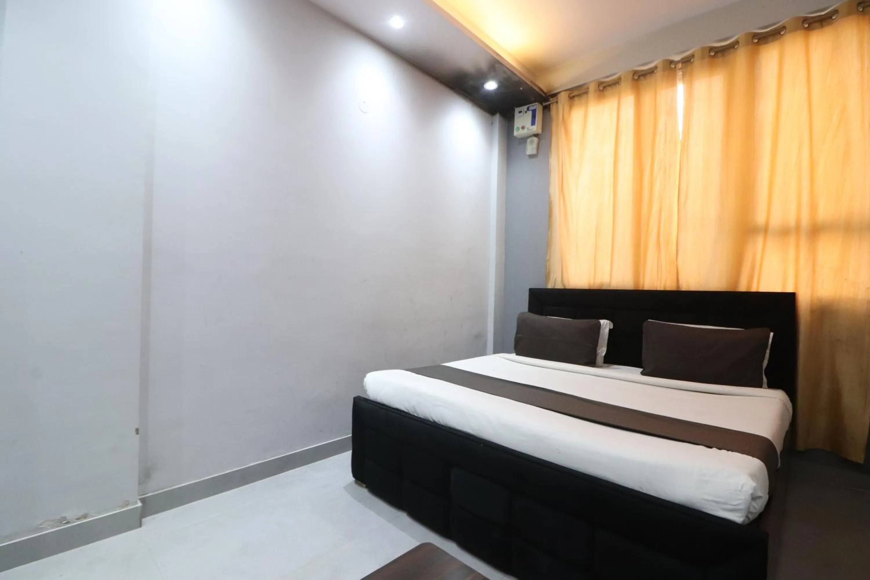 Photo of the whole room, Bed in Twamev couple Friendly Rajouri garden by The Arrow