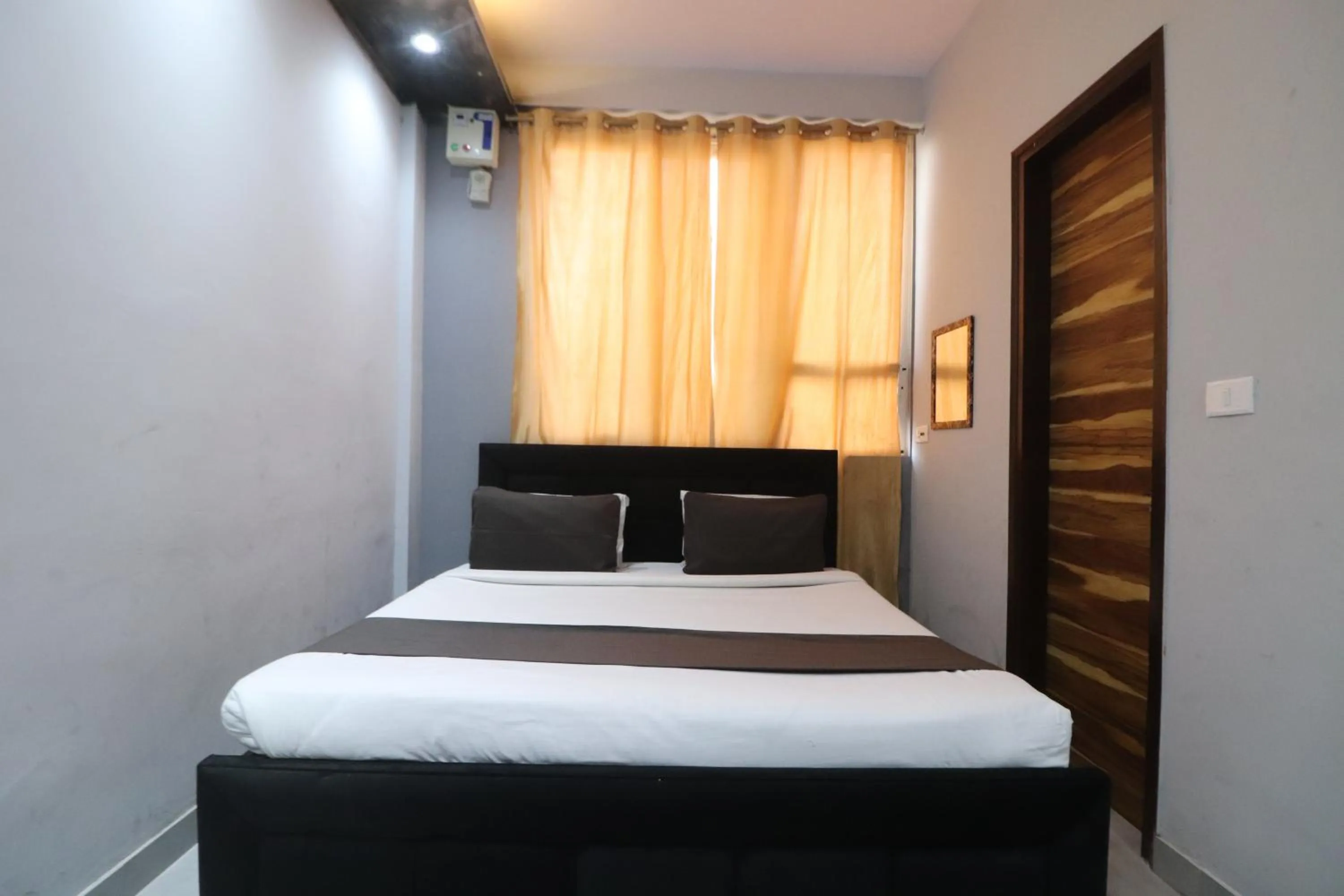 Photo of the whole room, Bed in Twamev couple Friendly Rajouri garden by The Arrow