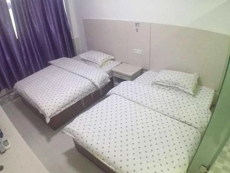 Bed in Seven Orange Hotel