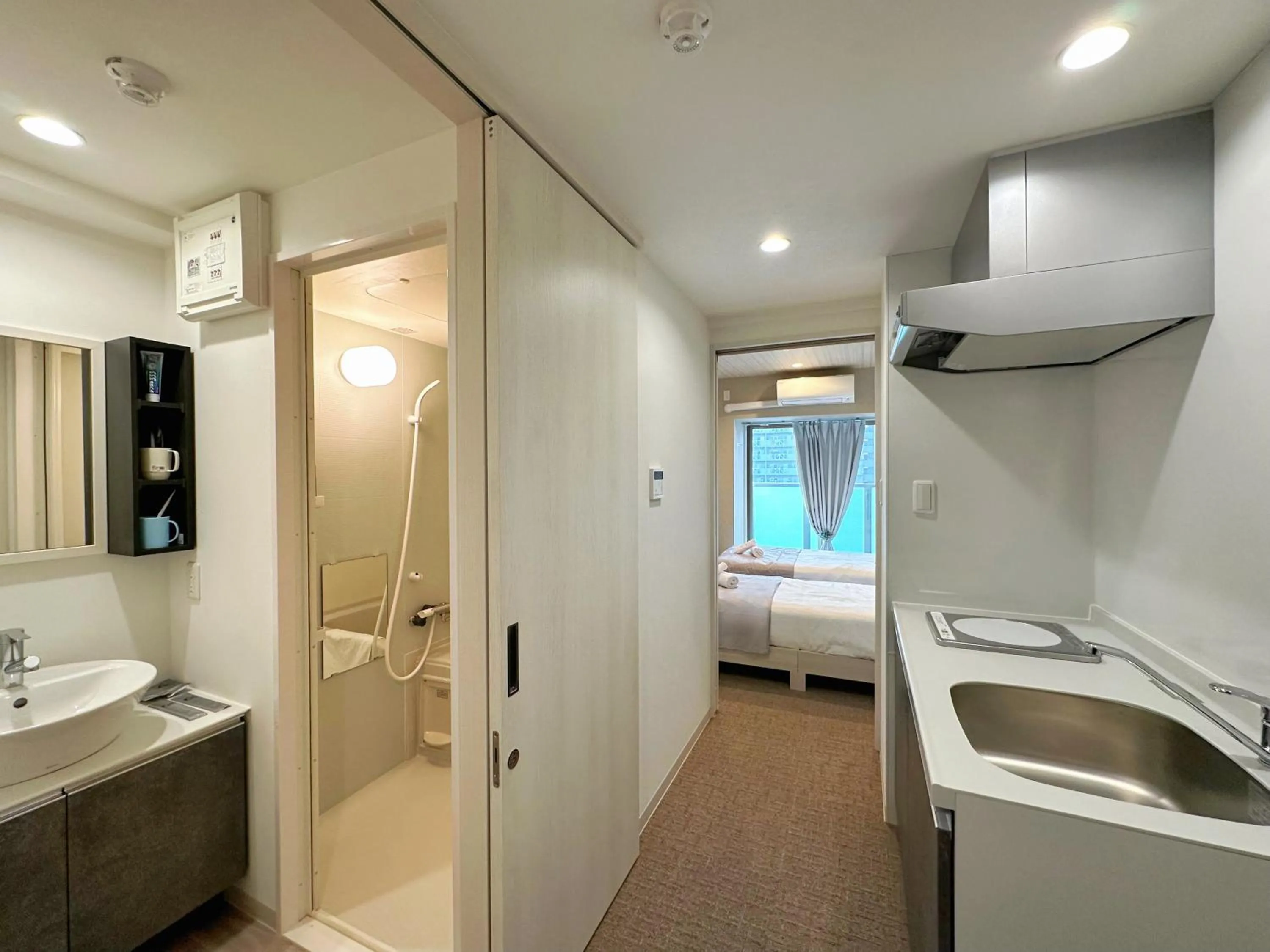 Photo of the whole room, Bed in Hoshino Stay 2 花园町站步行3分钟 地铁5分钟到难波 8分钟到心斋桥 15分钟到梅田