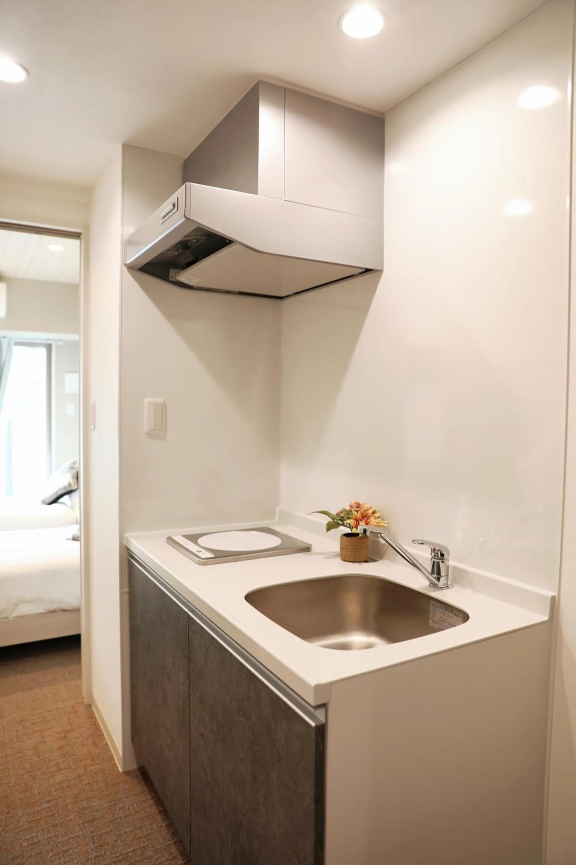 Kitchen or kitchenette in Hoshino Stay 2 花园町站步行3分钟 地铁5分钟到难波 8分钟到心斋桥 15分钟到梅田