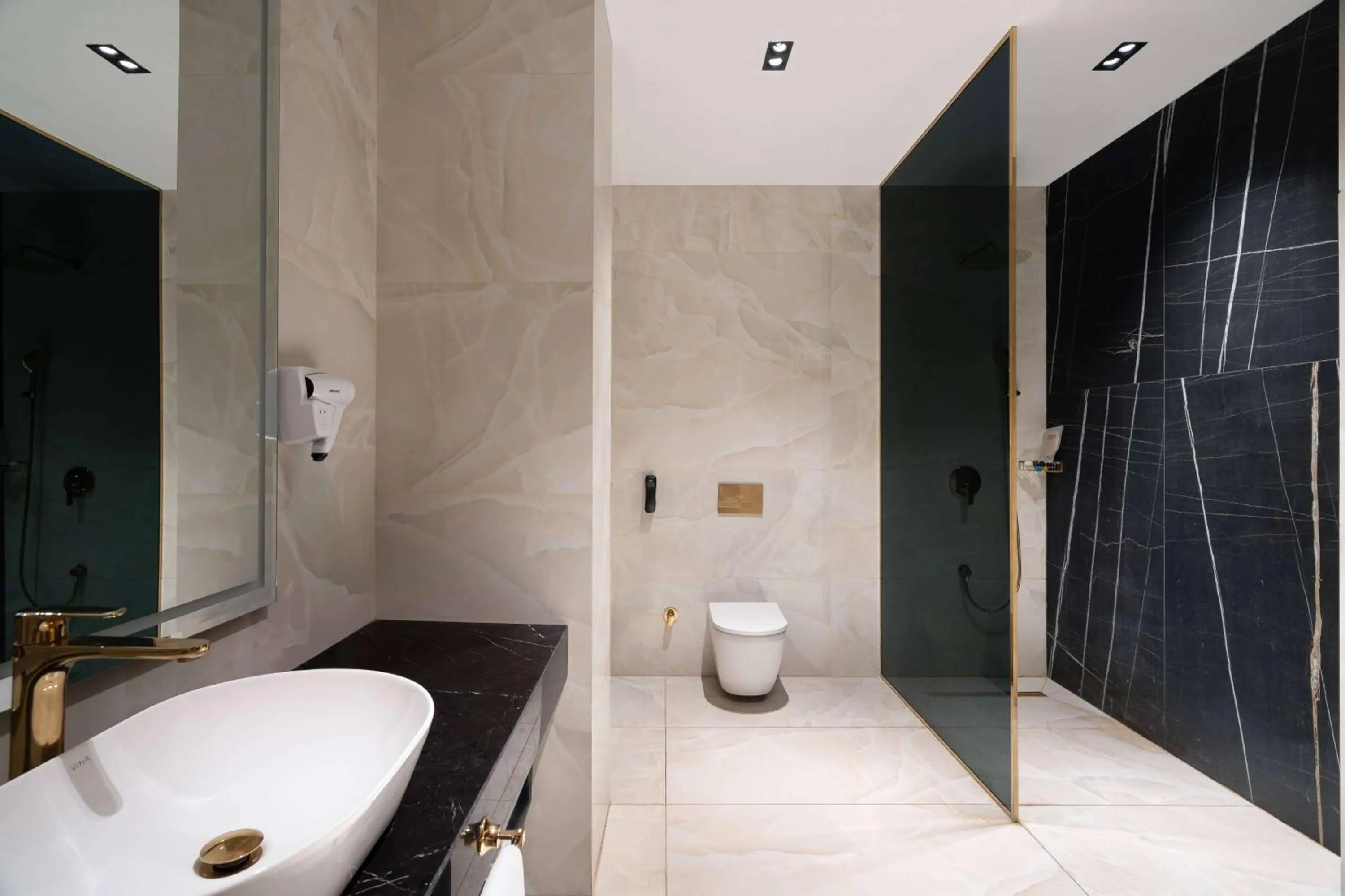 Bathroom in Ramada Hotel & Suites by Wyndham Erbil 32 Park