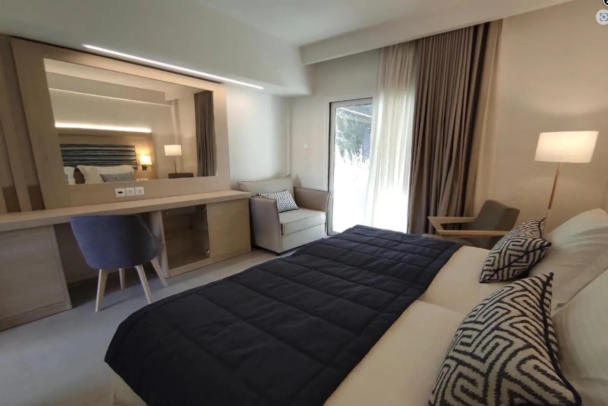 Bed in O Paradise beach Resort and Spa