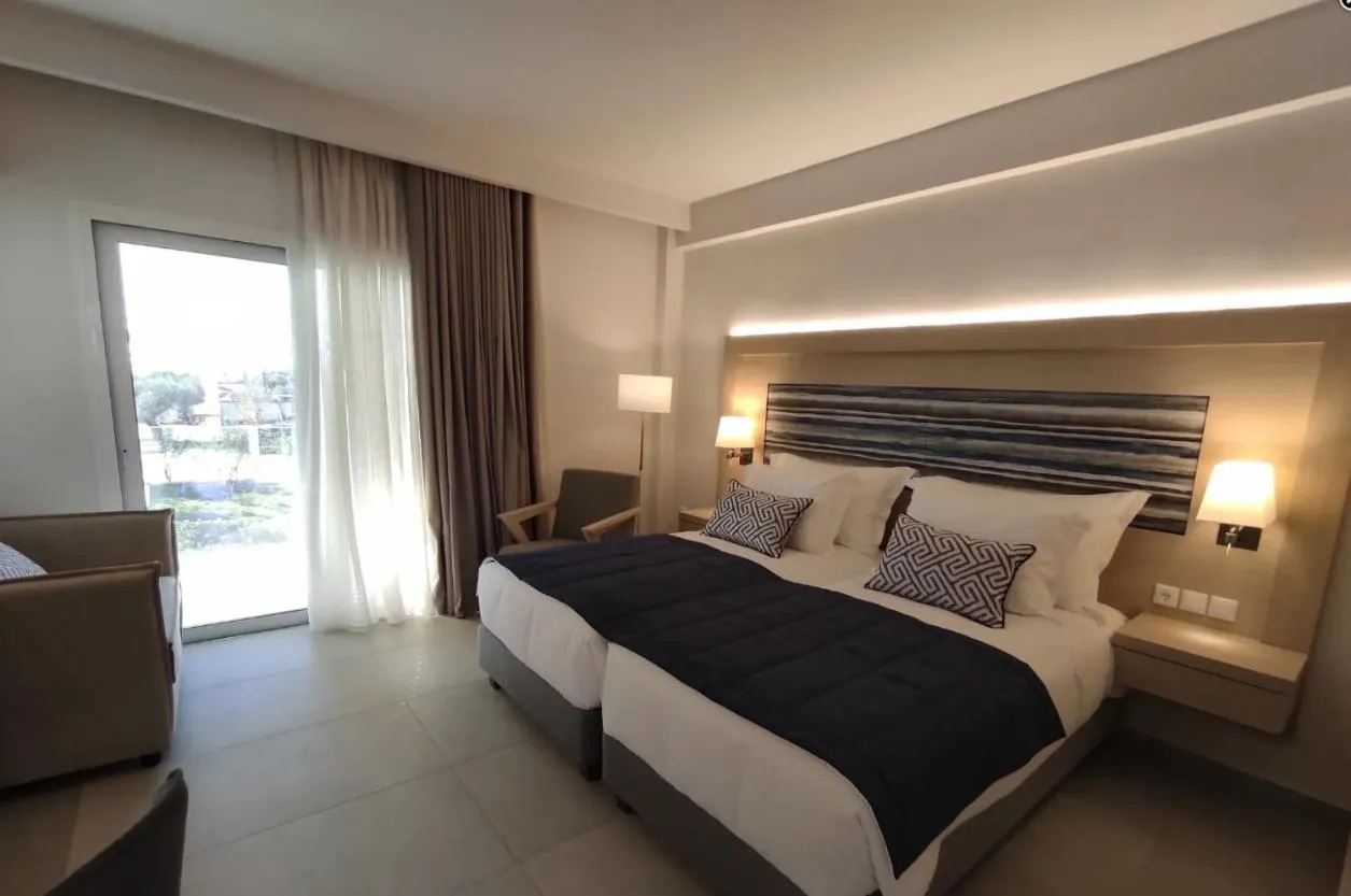 Bed in O Paradise beach Resort and Spa