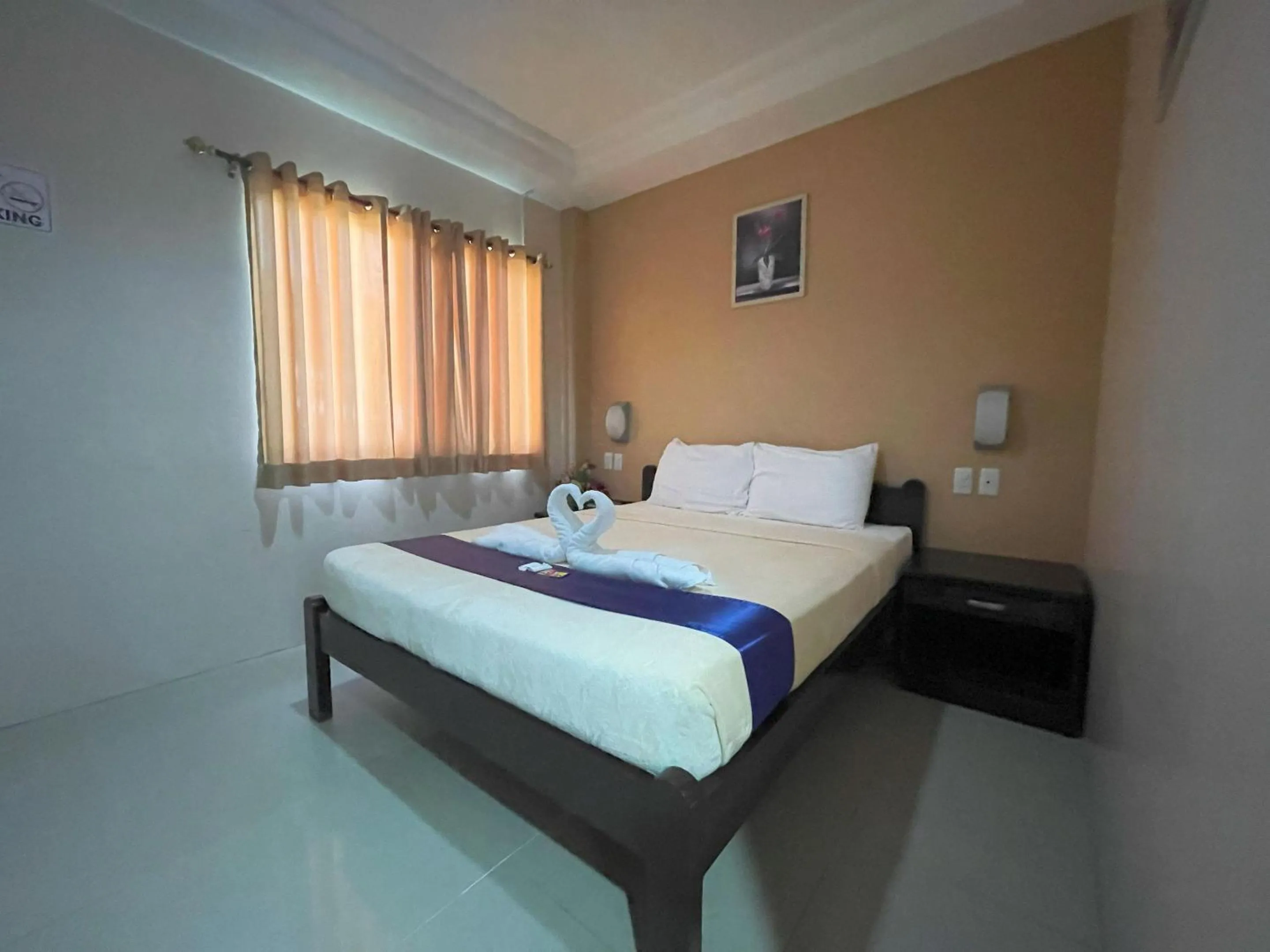 Bed in Argao Seabreeze Hotel powered by Cocotel